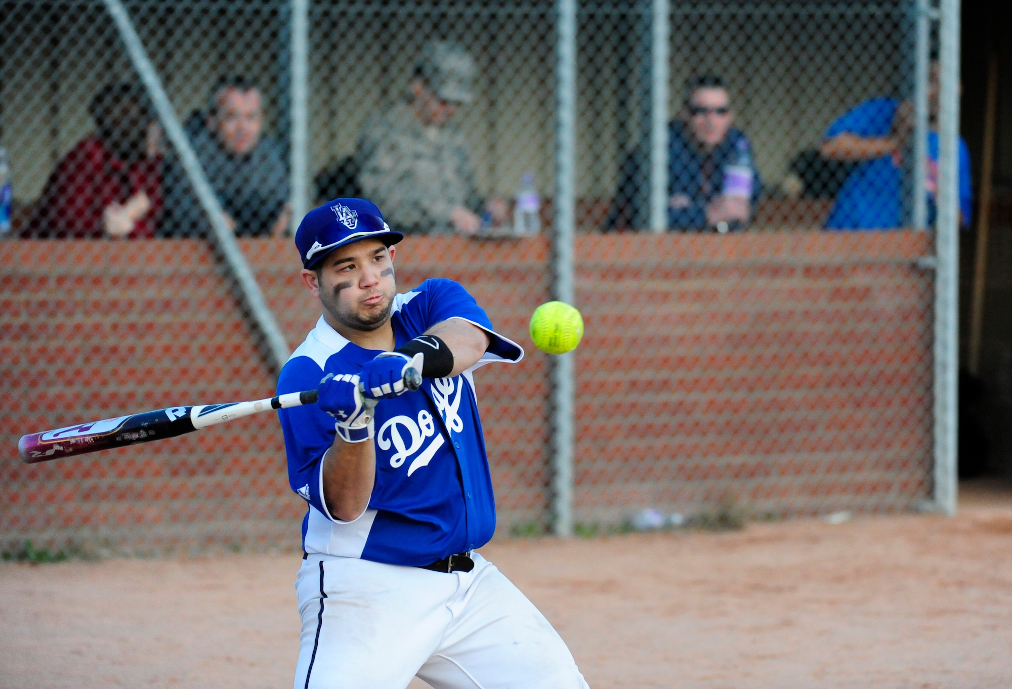 RAF MILDENHALL, England – Nolan Luna-Chavez, 100th Communications Squadron, bats during an intramural softball game against the 100th Aircraft Maintenance Squadron at RAF Mildenhall June 20, 2012. The intramural softball league began May 9 and is composed of teams from various squadrons around base. (U.S. Air Force photo/Senior Airman Ethan Morgan) 