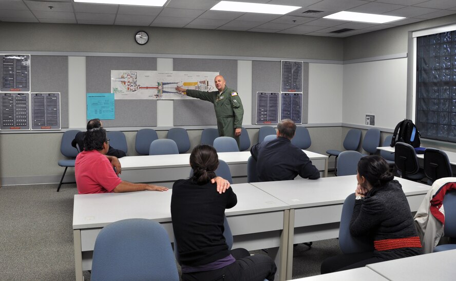 Col. Steven Vautrain, 439th AW commander, fields questions from the civilian employers during their visit to the Eastern Regional C-130 Flight Simulator.  Reservists from the 439th Airlift Wing, Westover Air Reserve Base, along with civilian employers spent a couple of days visiting Dobbins and the Lockheed Martin Aeronautics Corporation, Marietta, Ga., June 14-15. (U.S. Air Force photo/Senior Airman Elizabeth Gaston)