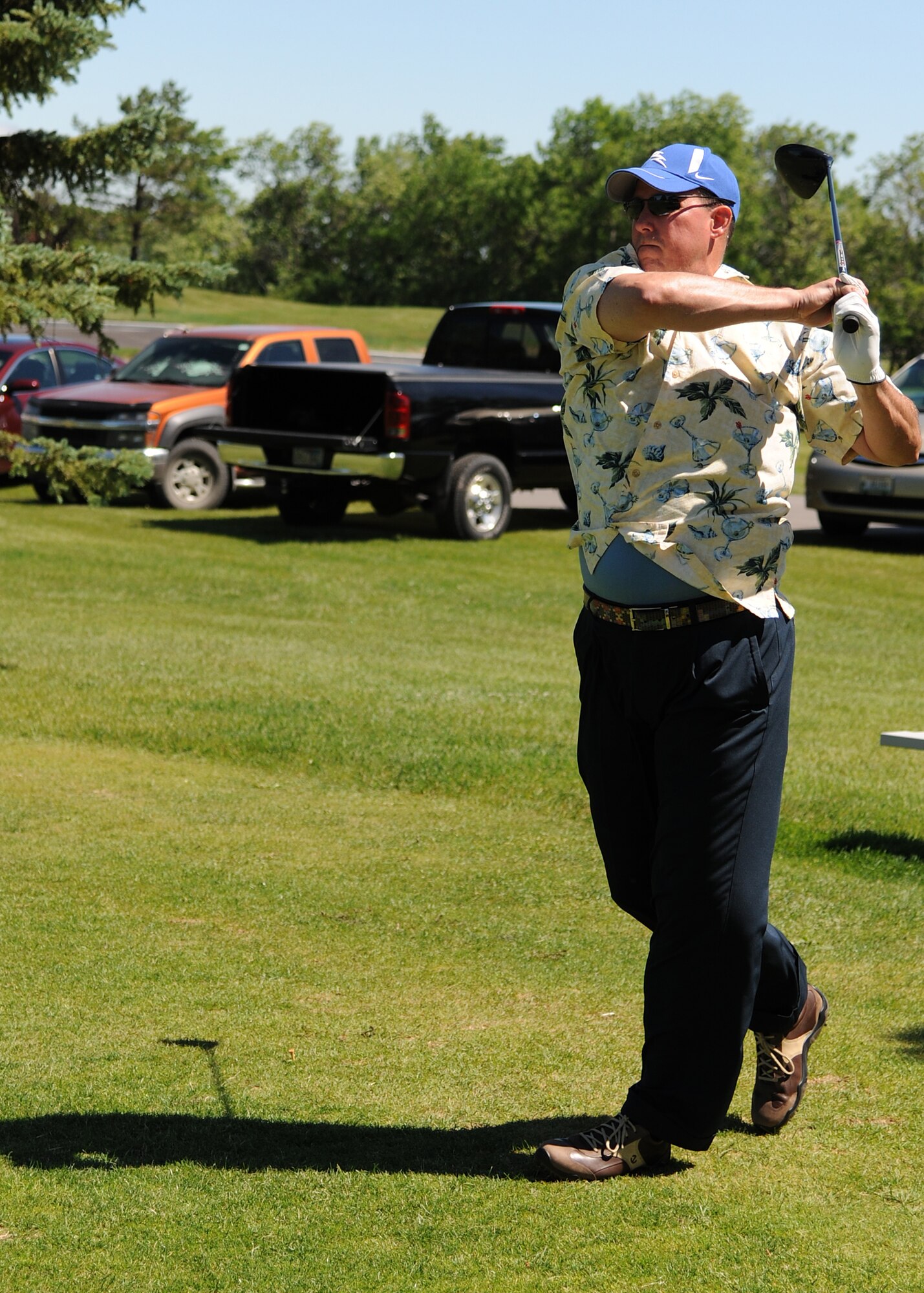 Col. Tim Bush, commander of the 319th Air Base Wing, participates in the annual Military Affairs Committee golf tournament on June 18, 2012, on Grand Forks Air Force Base, N.D. (U.S. Air Force photo/Airman 1st Class Ashley N. Taylor)
