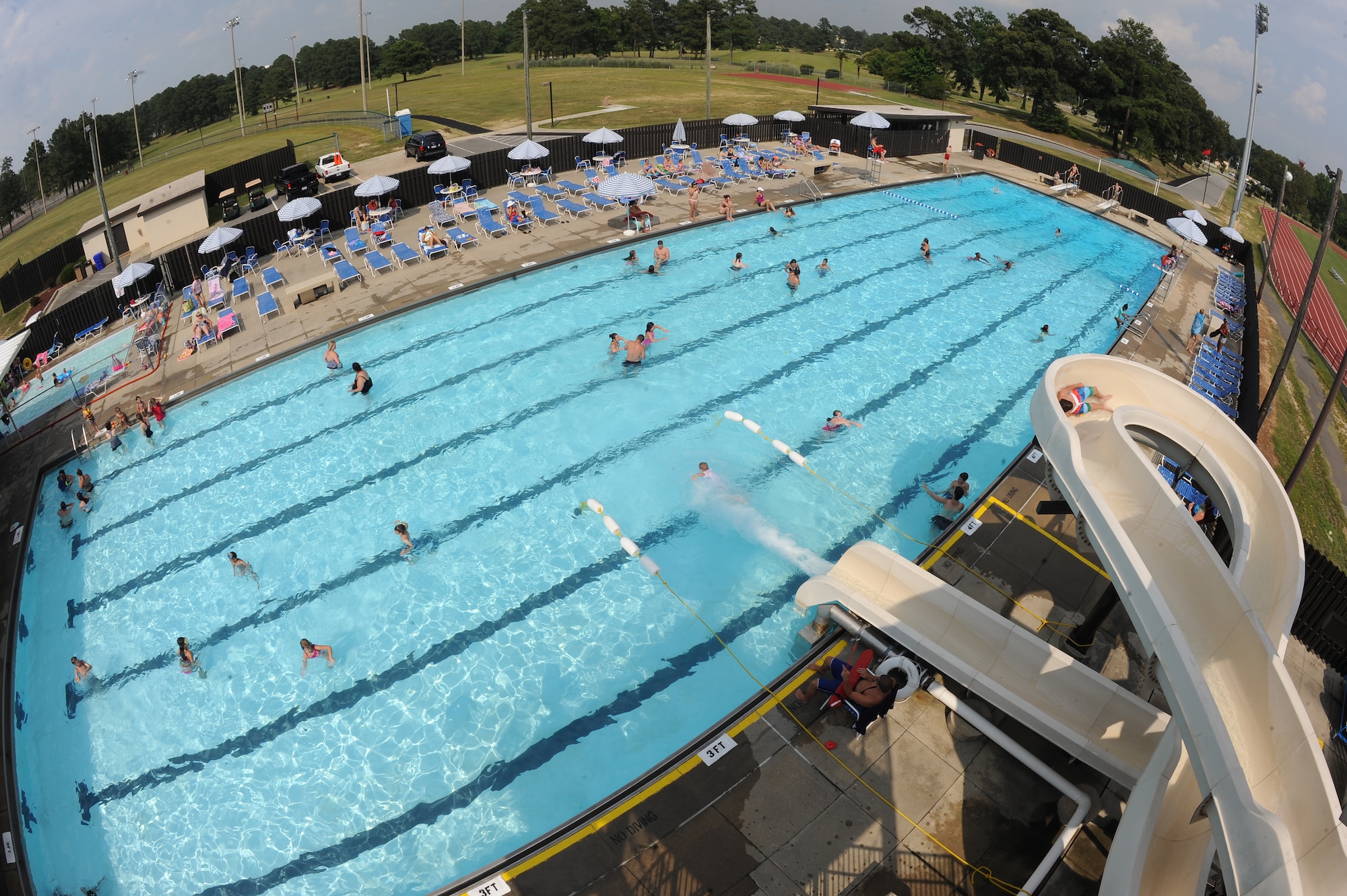 Airmen and their families enjoy the base swimming pool at the fitness center on Seymour Johnson Air Force Base, N.C., June 19, 2012. The base pool is open from 1 to 6:00 p.m. daily. (U.S. Air Force photo/Airman 1st Class John Nieves Camacho/Released)