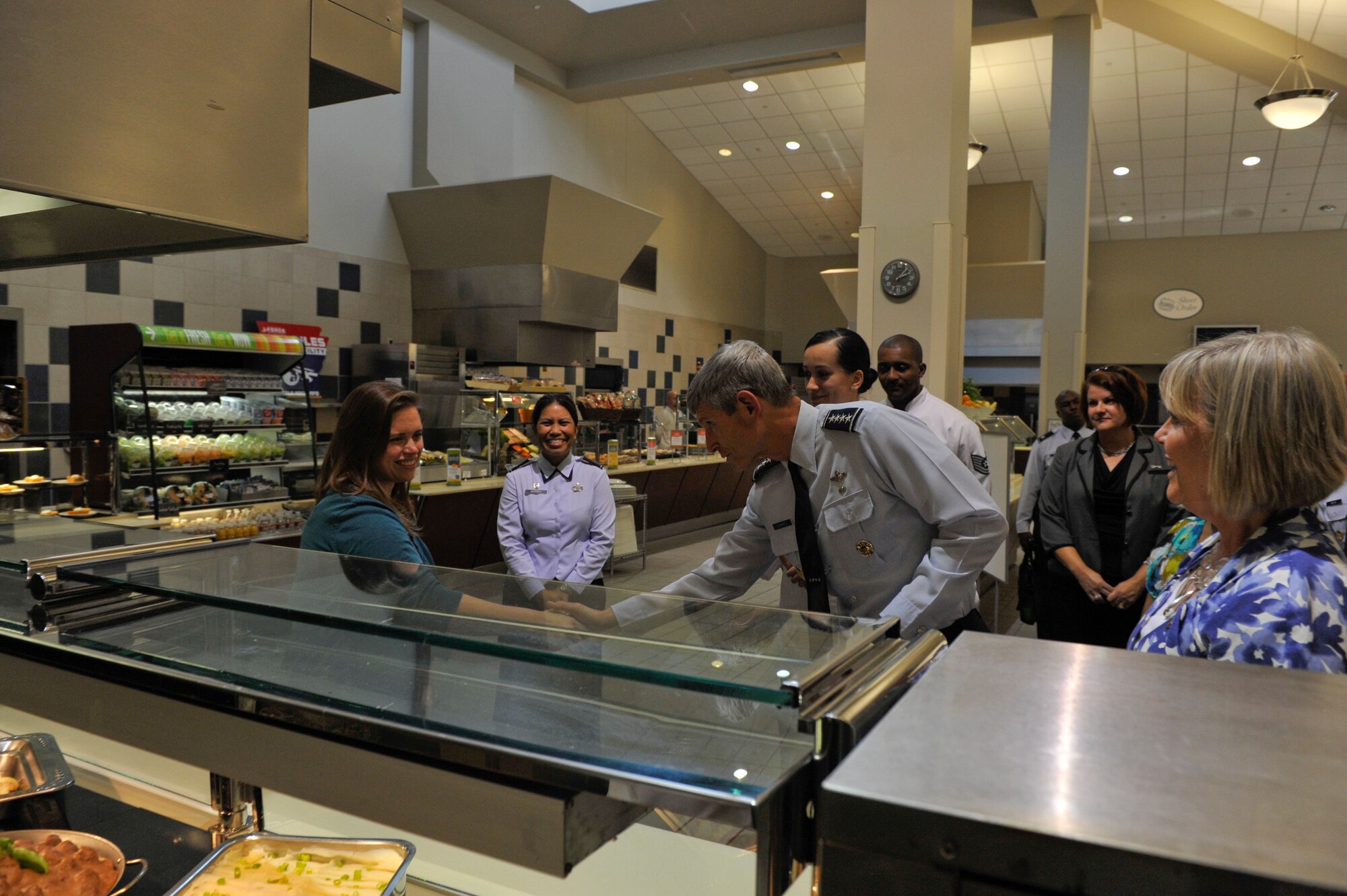 Gen. Norton Schwartz, Air Force Chief of Staff greets Jill Hinsley, a 19th Medical Group dietician, inside the Hercules Dining Facility, June, 20, 2012, at Little Rock Air Force Base, Ark. During his visit at the Hercules Dining Facility Gen. Schwarz was briefed about the food transformation initiative program. 
(RELEASED U.S. Air Force photo/Airman 1st Class Rusty Frank)