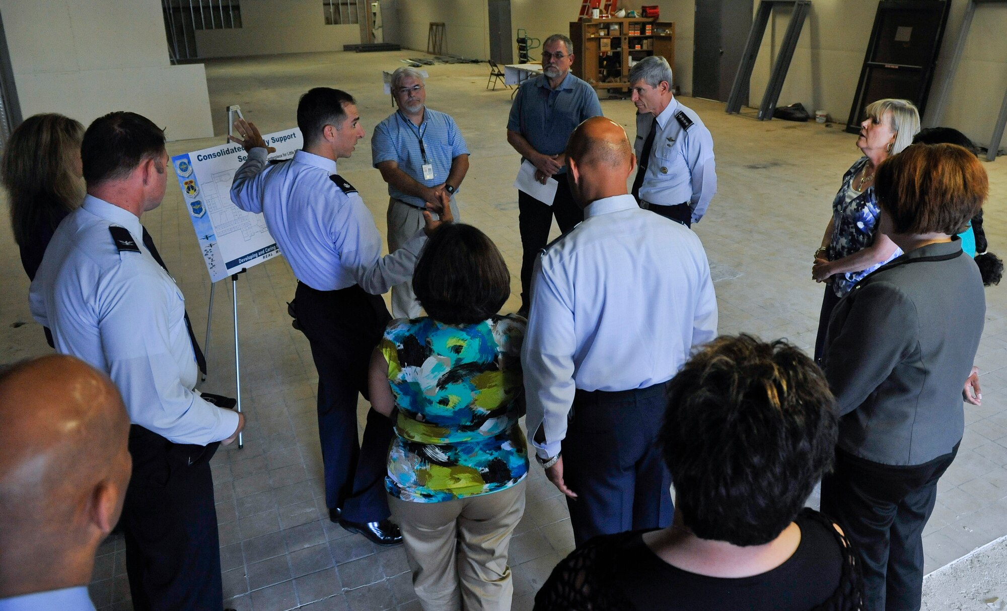 Lt. Col. Lance Clark, 19th Civil Engineer Squadron Commander, briefs Gen. Norton Schwartz, Air Force Chief of Staff, about the future consolidated family support center, June 20, 2012, at Little Rock Air Force Base, Ark. Schwartz toured Little Rock Air Force Base facilities and met with members of Team Little Rock. (RELEASED U.S. Air Force photo/Airman 1st Class Rusty Frank)