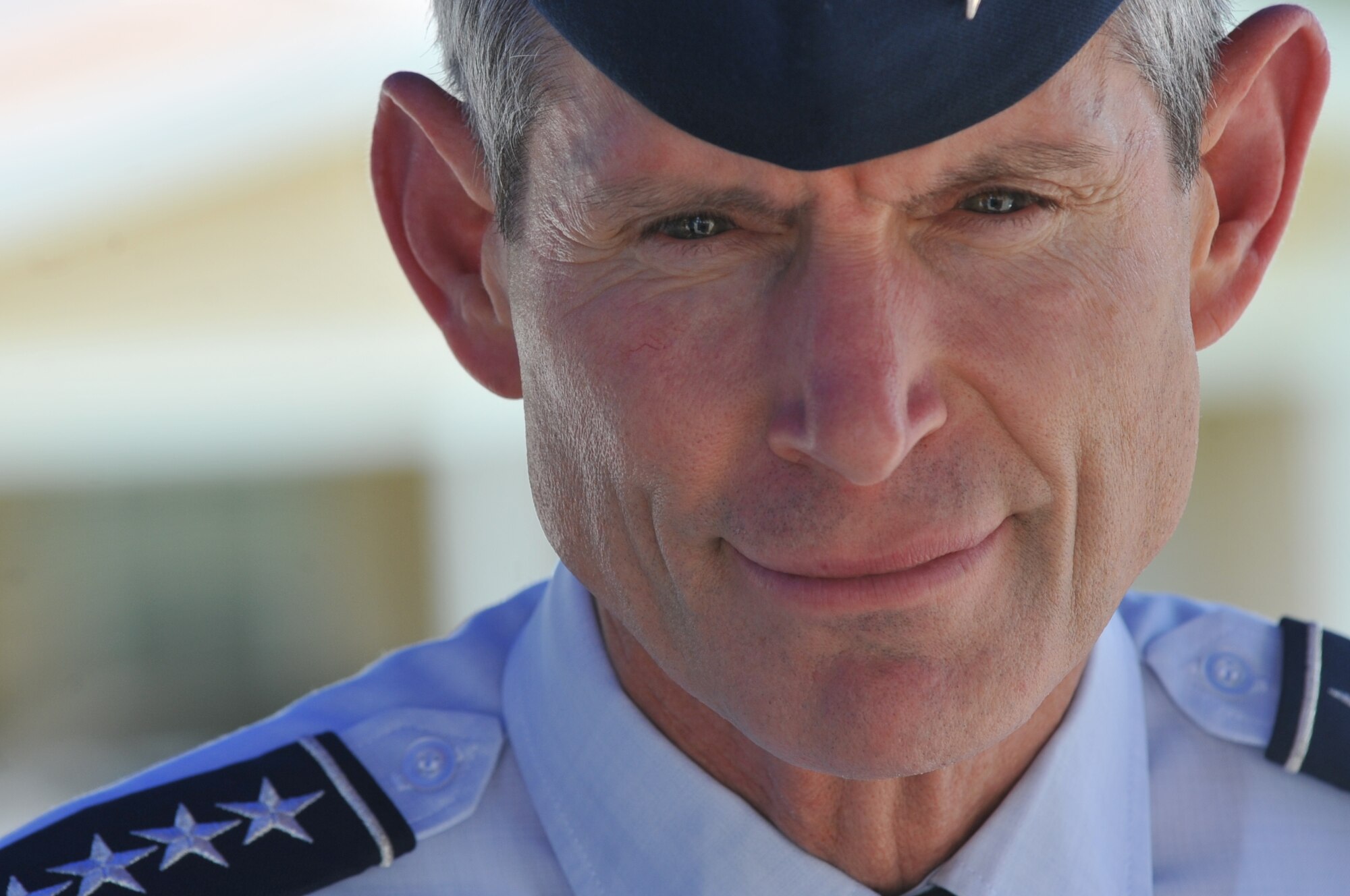 Gen. Norton Schwartz, Air Force Chief of Staff, listens to a briefing about base housing, June 20, 2012, at Little Rock Air Force Base, Ark. Schwartz toured Little Rock Air Force Base housing facilities as a part of his final official tour as Chief of Staff of the Air Force. (RELEASED U.S. Air Force photo/Airman 1st Class Rusty Frank)