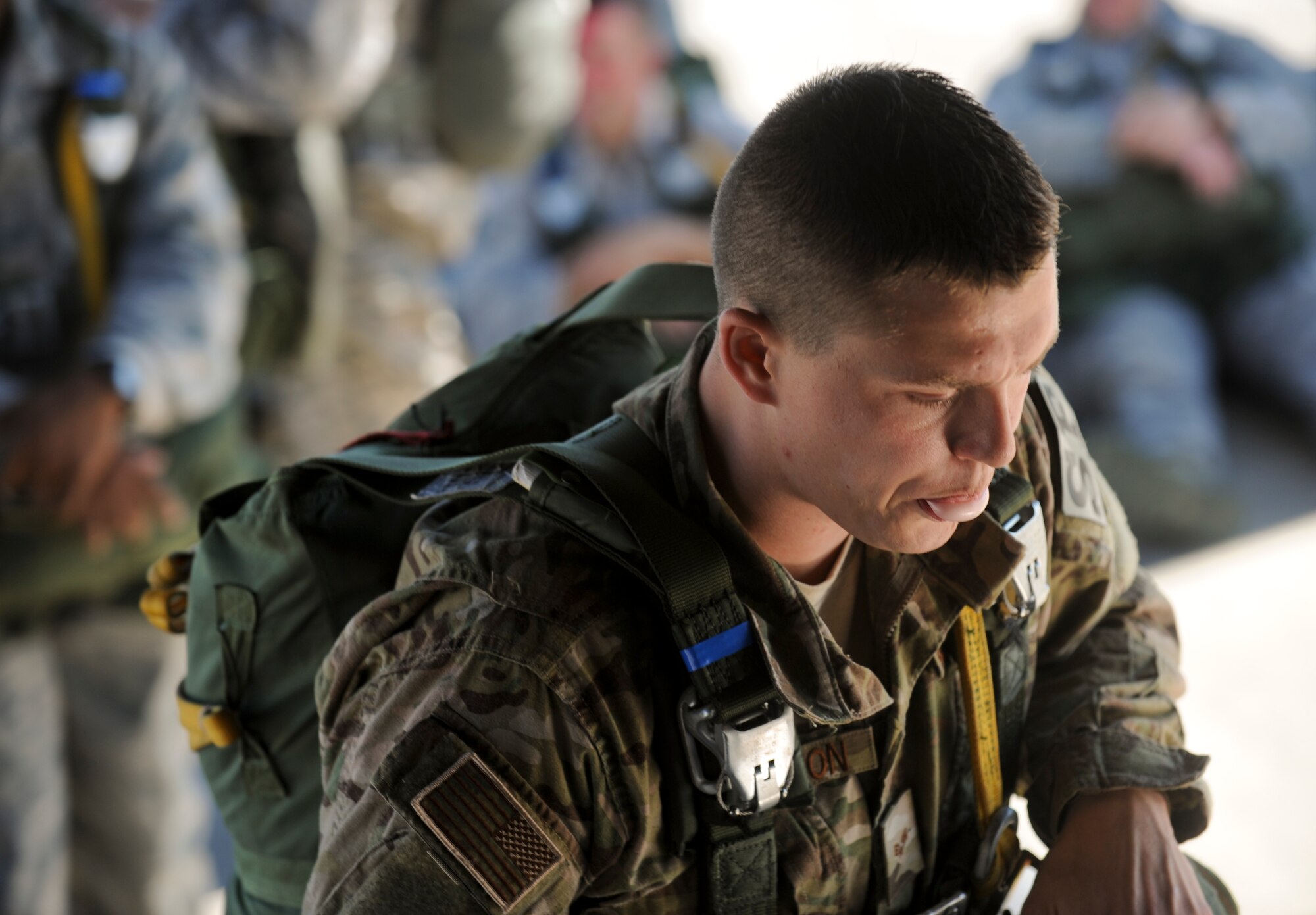U.S. Air Force Senior Airman Derek Halverson, 824th Base Defense Squadron fire team member, climbs into an HC-130P Combat King at Moody Air Force Base, Ga., June 19, 2012. This was Halverson’s 49th static line jump. (U.S. Air Force photo by Airman 1st Class Douglas Ellis/Released)

