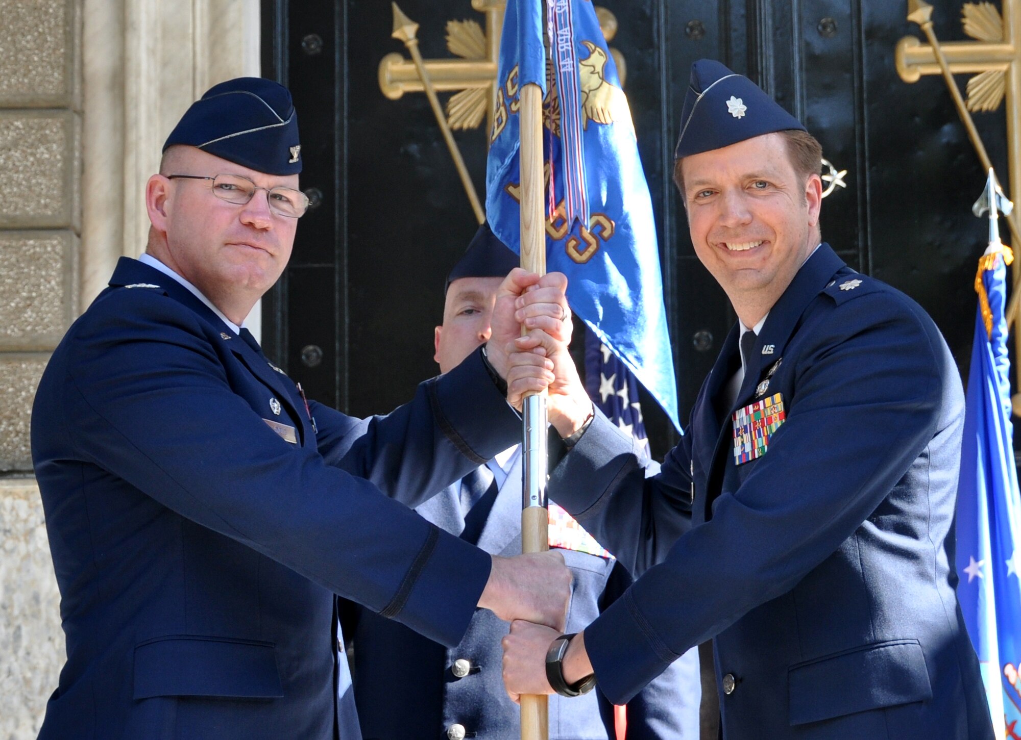 Lt. Col. Marc Galler, right, assumes command of the 425th Air Base Squadron June 20, 2012, at the Izmir chapel garden. The 425th ABS works as an administrative agent and provides mission support for the NATO Allied Air Command Headquarters, as well as six other associate units operating in Izmir, Turkey. (U.S. Air Force photo by Maj. Phylis Black/Released)
