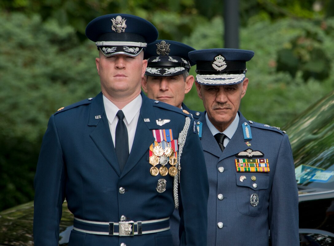 Maj. Gen. Malek Salameh Habashneh, Royal Jordanian Air Force commander, and
Air Force Chief of Staff Gen. Norton Schwartz are escorted by an Air Force Honor Guard member to an official arrival ceremony June, 19, 2012, at the Air Force Memorial in Arlington, Va. General Malek, who is visiting the United States as part of the U.S. Air Force Chief of Staff Counterpart Visit Program, was presented with the Legion of Merit, Degree of Commander, at the ceremony. (U.S. Air Force photo/Senior Airman Perry Aston)
