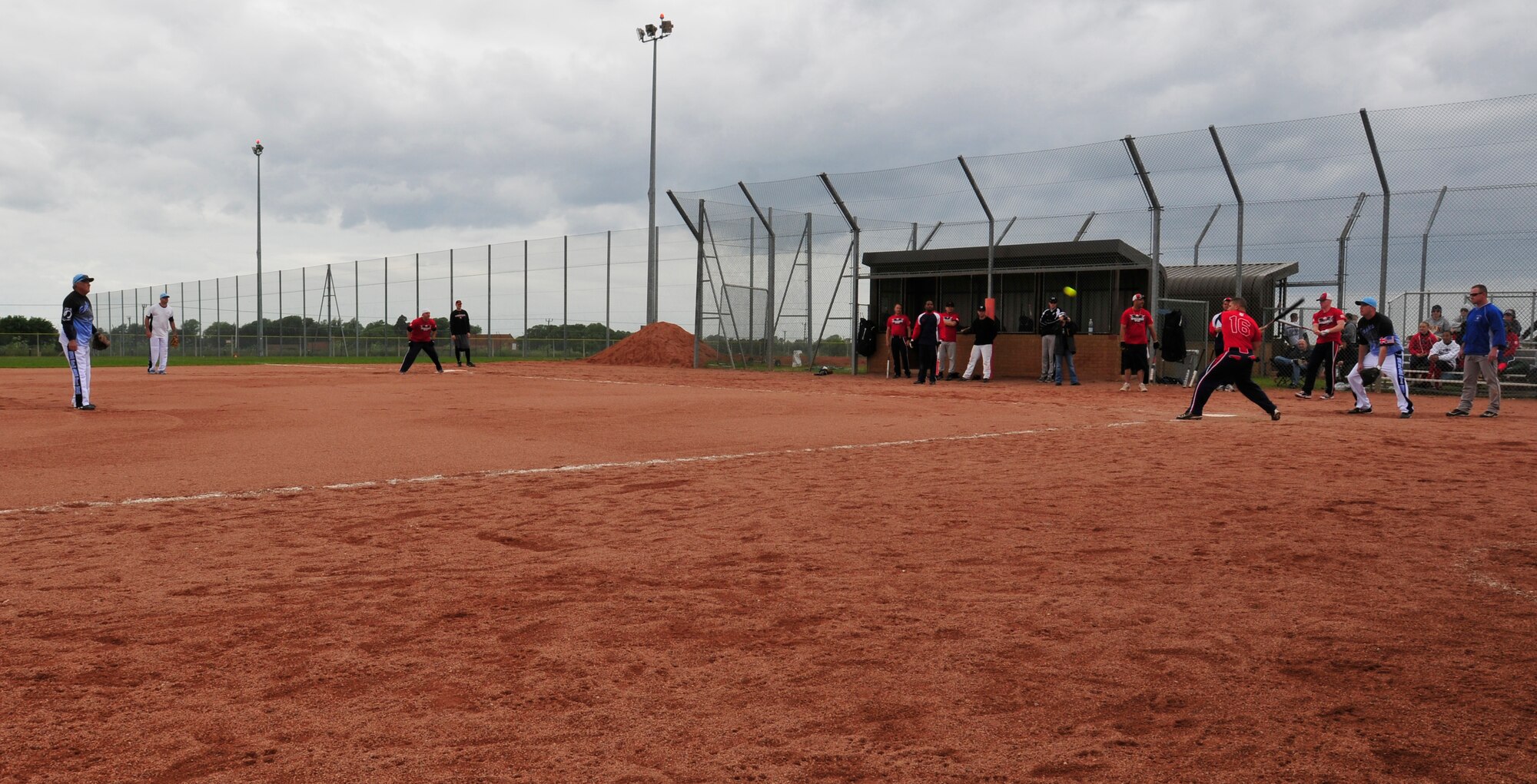ROYAL AIR FORCE LAKENHEATH, England – Members of the RAF Lakenheath and Spangdahlem Air Base, Germany men’s softball teams compete during the first RAF Lakenheath Invitiational at the softball fields June 17, 2012. Men and women’s softball teams from American bases throughout the U.K. and Germany came out to compete June 16 and 17. The Lakenheath men’s team finished 1st place with eight wins and three losses. (U.S. Air Force photo by Senior Airman Tiffany M. Deuel)  