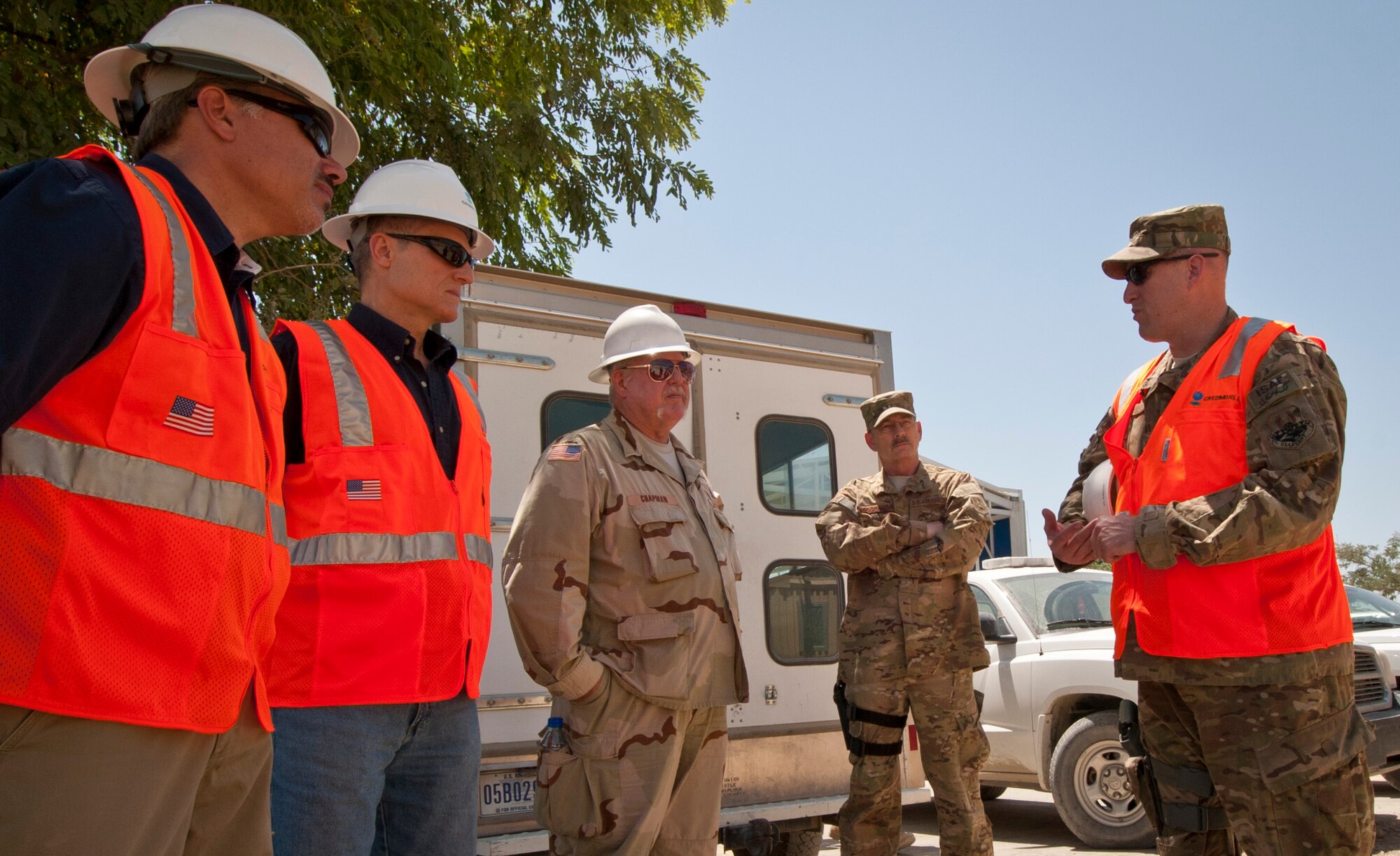 Col. Erik Rundquist, 455th Expeditionary Mission Support Group commander, speaks to construction contractors prior to the ground breaking of the future 455 EMSG headquarters building at Bagram Airfield, Afghanistan, June 20, 2012. When complete, EMSG leaders will oversee various mission support functions from the new building. (U.S. Air Force photo/Capt. Raymond Geoffroy)