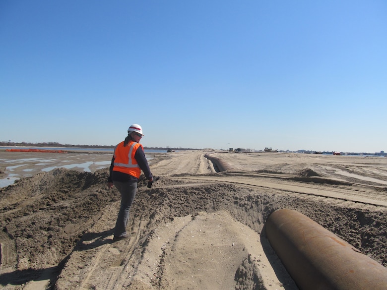 NEW YORK — Melissa Alvarez, U.S. Army Corps of Engineers Project Biologist, inspecting the sand placement at the island.

