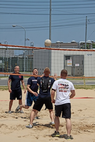 The Brews Brothers, an Amazing Race team, participates in the volleyball challenge portion of the race, which took place across the station June 22, 2012. The race consisted of 10 teams running across the station to complete 14 different events in the fastest time possible.