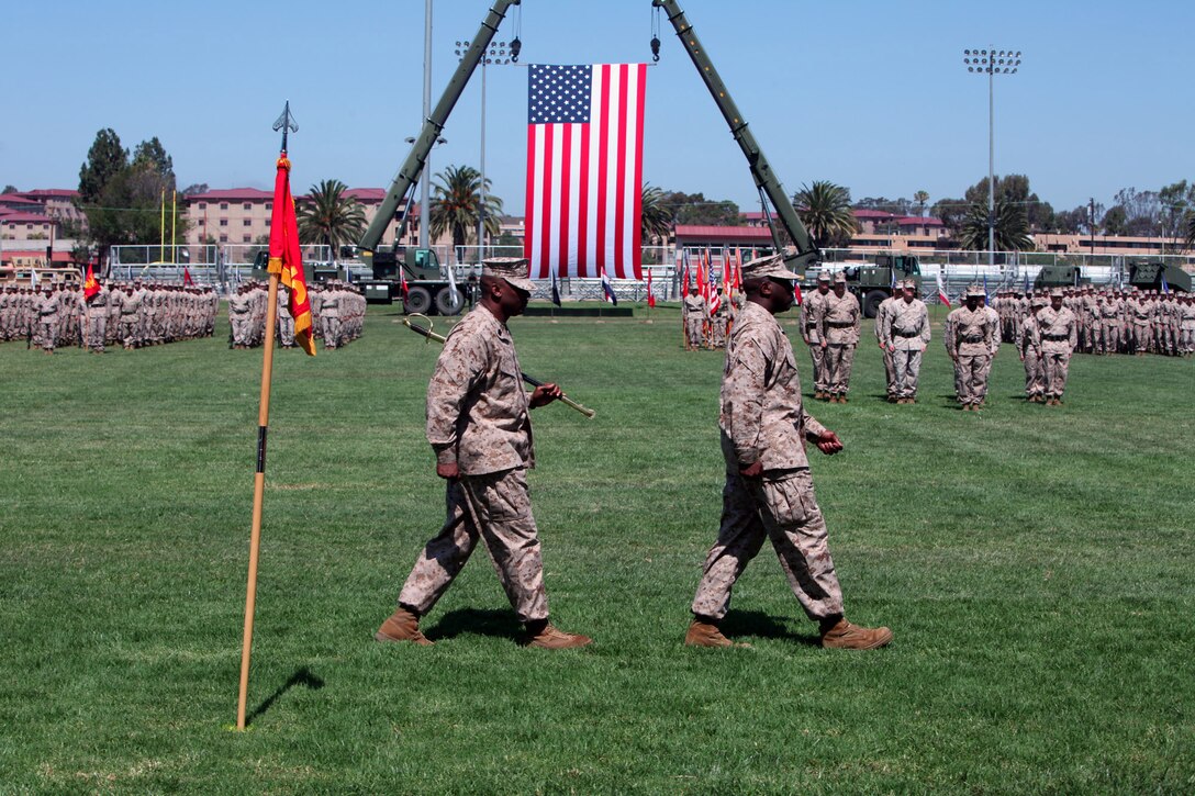 Sgt. Maj. Randall Carter, sergeant major of I Marine Expeditionary Force and U.S. Marine Forces Central Command, was relieved by Sgt. Maj. Ronald L. Green during a relief, appointment and retirement ceremony aboard Camp Pendleton, June 22. Sgt. Maj. Green was assigned as the Marine Forces Europe sergeant major from August 2010 to May 2012. His previous assignments include duties at Headquarters Battalion, Headquarters Marine Corps, Henderson Hall in Arlington, Va., and Marine Light Attack Helicopter Squadron 169, 3d Marine Aircraft Wing. 