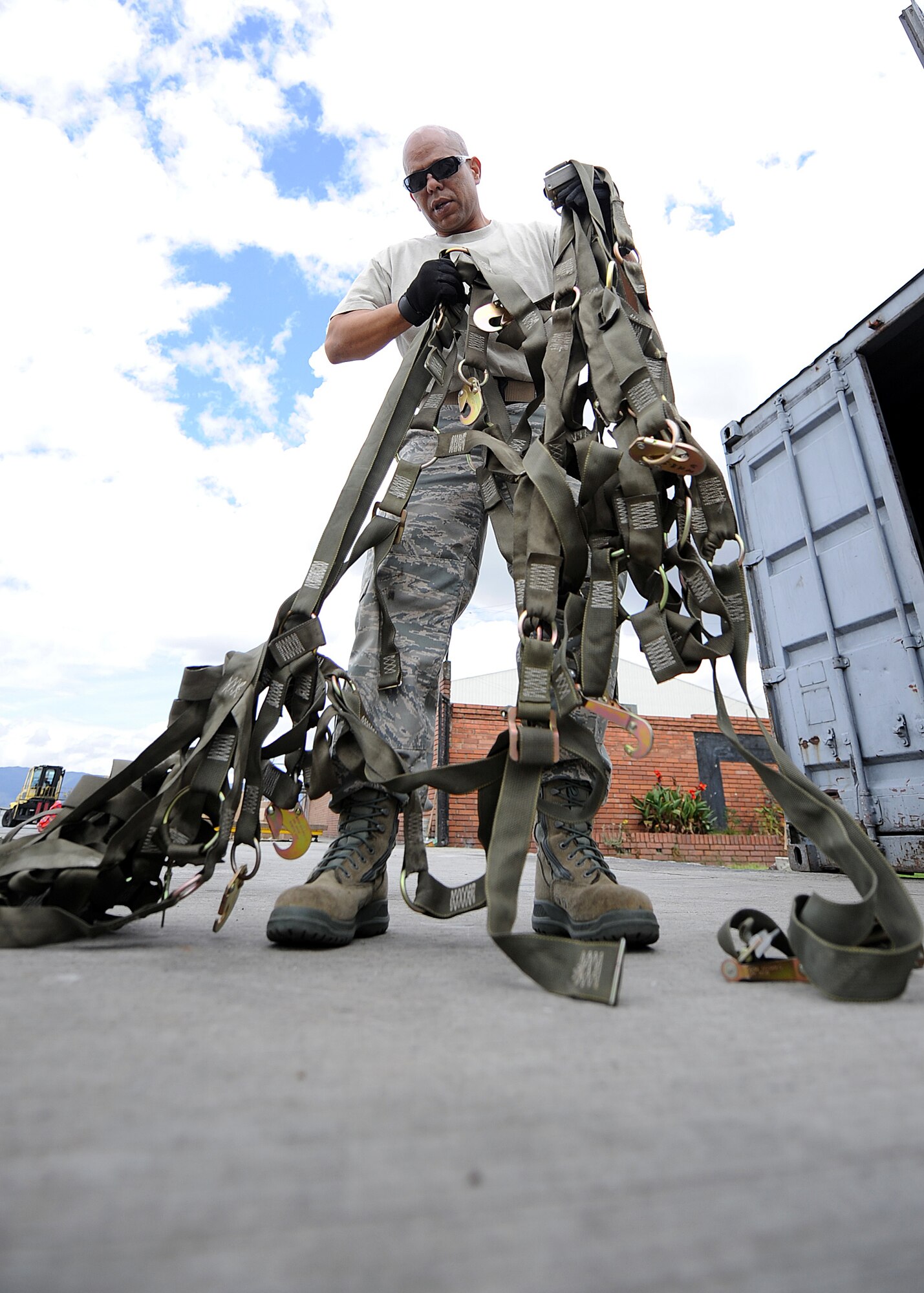 Technical Sgt. Luis Sanchez, 571st Mobility Support Advisory Squadron aircraft maintenance air advisor, does an inventory and a side and top net inspection during an Air Mobility Command Building Partner Capacity mission June 20 at Commando Aéreo de Transporte Militar, Bogota, Colombia.  The 571st is participating in a month-long BPC mission with the Colombian air force to promote regional stability by fostering key relationships and enhancing partner nation capabilities.  The mission also supports the 12th Air Force’s (AFSOUTH) continued engagements in the U.S. Southern Command area of responsibility of Latin America and the Caribbean.  In addition, the 571st reached out to Inter-American Air Forces Academy and 12th AF (AFSOUTH) for assistance to complement their team. (U.S. Air Force photo by Tech. Sgt. Lesley Waters)