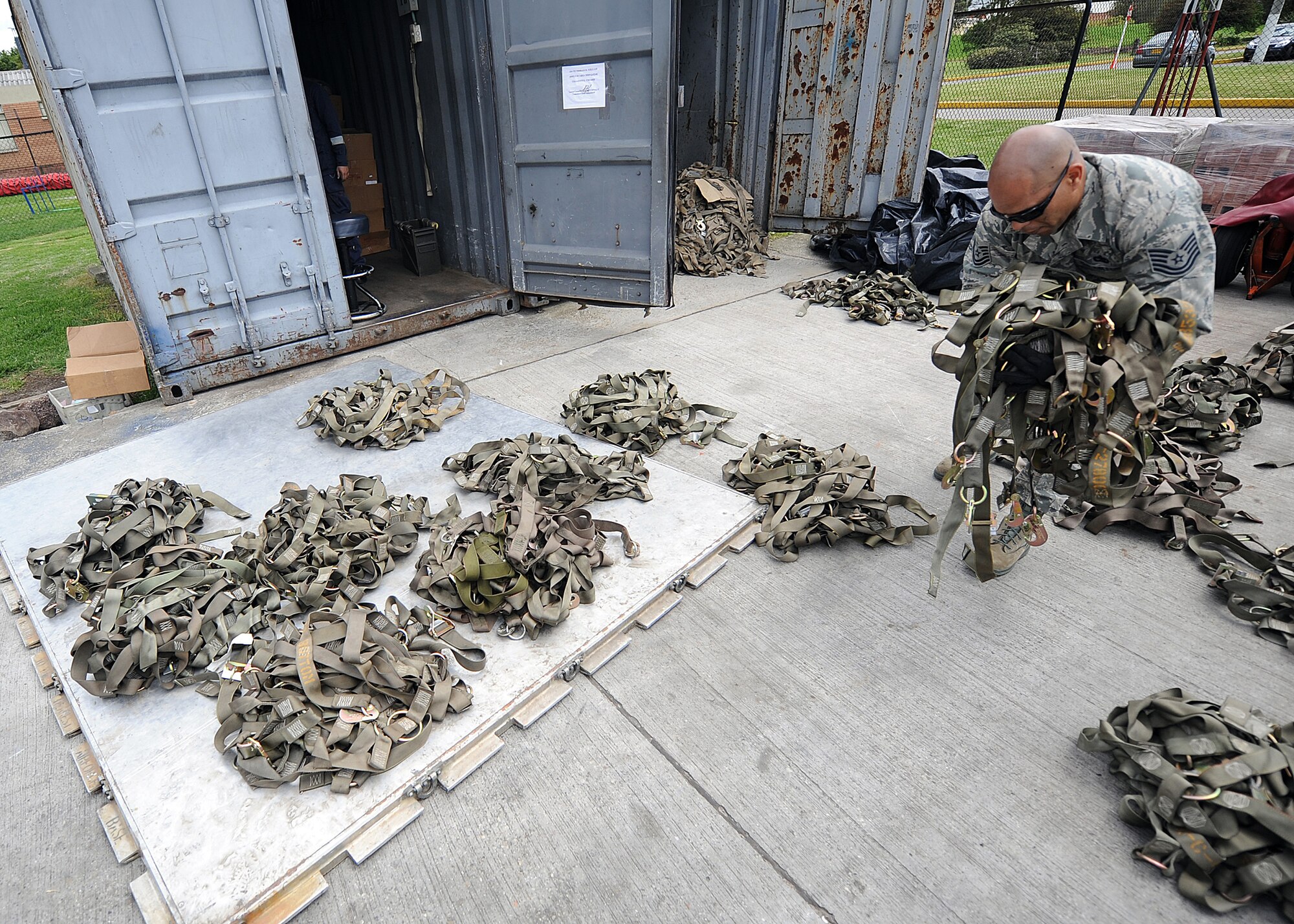 Technical Sgt. Luis Sanchez, 571st Mobility Support Advisory Squadron aircraft maintenance air advisor, does an inventory and a side and top net inspection during an Air Mobility Command Building Partner Capacity mission June 20 at Commando Aéreo de Transporte Militar, Bogota, Colombia.  The 571st is participating in a month-long BPC mission with the Colombian air force to build stronger international air force cooperation, interoperability and mutual support.  The mission also supports the 12th Air Force’s (AFSOUTH) continued engagements in the U.S. Southern Command area of responsibility of Latin America and the Caribbean.  (U.S. Air Force photo by Tech. Sgt. Lesley Waters)