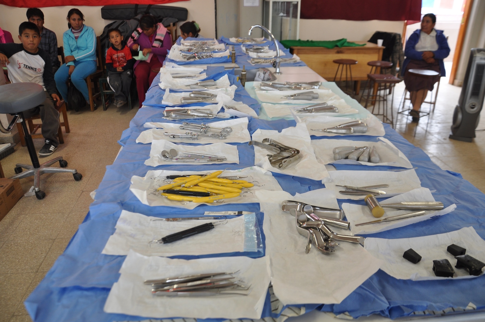 SAN CLEMENTE, Peru—Dental tools and patients wait for their turn June 21 during the first medical readiness and training exercise offered in the area as part of New Horizons, a U.S. Southern Command-sponsored humanitarian assistance and training exercise that takes place annually in Latin American and Caribbean countries. New Horizons Peru affords Air Force medical personnel the opportunity to hone their skills and train alongside their Peruvian military counterparts. As part of New Horizons Peru, U.S. and Peruvian medics are planning to provide free medical care to about 30,000 Peruvians for communities in need. (U.S. Air Force photo by Capt. Candace N. Park/released)