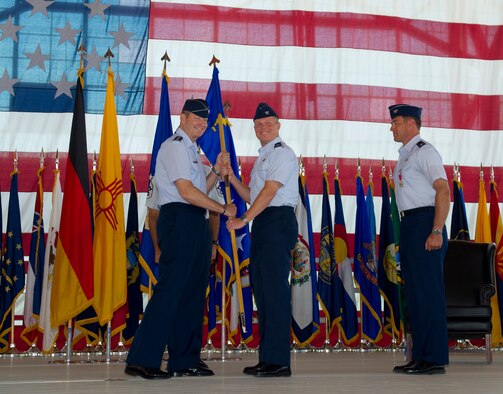 Colonel Andrew Croft, incoming 49th Wing commander, takes command of the 49th WG during the 49th WG change of command ceremony at Holloman Air Force Base, N.M., June 22. Croft will be the second commander of the 49th WG since it changed from the 49th Fighter Wing in June of 2010. Croft was previously the commander of the 12th Operations Group, Joint Base San Antonio-Randolph, Texas. (U.S. Air Force Photo by Airman 1st Class Michael Shoemaker/Released)