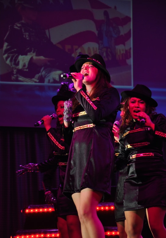 Members of Tops in Blue perform a Michael Jackson tribute at Beale Air Force Base, Calif., June 16, 2012. TIB is an active duty Air Force special unit made up of talented performers selected for their entertainment abilities. (U.S. Air Force photo by Staff Sgt. Robert M. Trujillo/Released)