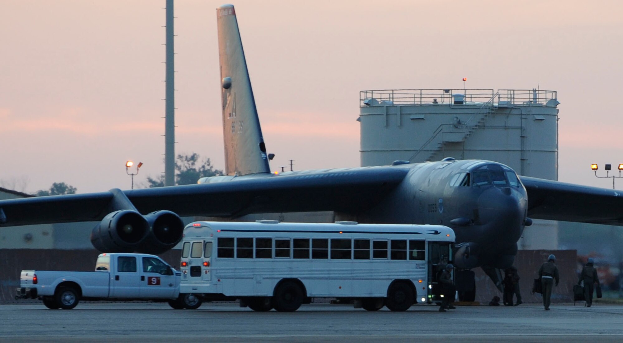 Aircrew members prepare to enter a B-52H Stratofortress on Barksdale Air Force Base, La., June 20. Aircrew members participated in a 17-hour Joint Chiefs of Staff-directed exercise. The results of the exercise will be given to the Secretary of Defense and Barksdale historically receives outstanding ratings. (U.S. Air Force photo/Airman 1st Class Joseph A. Pagán Jr.)(RELEASED)