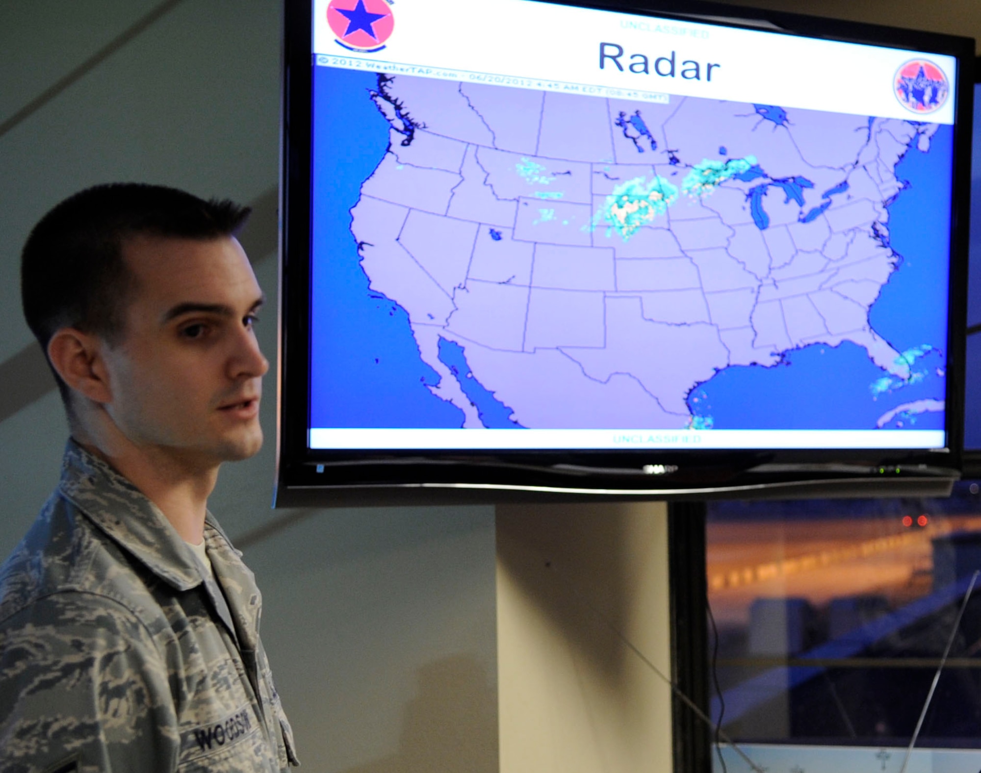 Staff Sgt. Philip Woodson, 2nd Operational Support Squadron duty forecaster, briefs aircrew members before takeoff on Barksdale Air Force Base, La., June 20. Aircrew members were pre-briefed on the weather the teams might have faced during the 17-hour mission. (U.S. Air Force photo/Airman 1st Class Joseph A. Pagán Jr.)(RELEASED) 