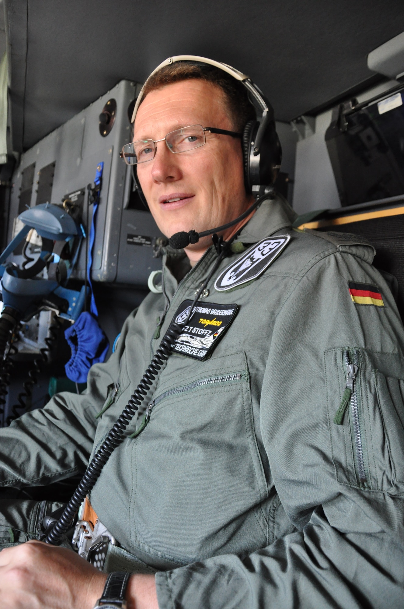 Lt. Col. Thomas Vauderwange, German Luftwaffe, enjoys a flight aboard a 403rd Wing WC-130J; he also flew with the 815th Airlift Squadron aboard their C-130J-30. Vauderwagne was one of two officers hosted by the 403rd Wing as part of the Department of Defense Reserve Officer Foreign Exchange Program. The purpose of the DoD ROFEP is to provide National Guard and Reserve officers training associated with mobilization duties while enhancing their ability to work and communicate with the military individuals of the host nation. To learn more about the program visit the DoD ROFEP website at http://ra.defense.gov/programs/rtm/rofep.html. (photo courtesy of Lt. Col. Max Kronenbitter)
