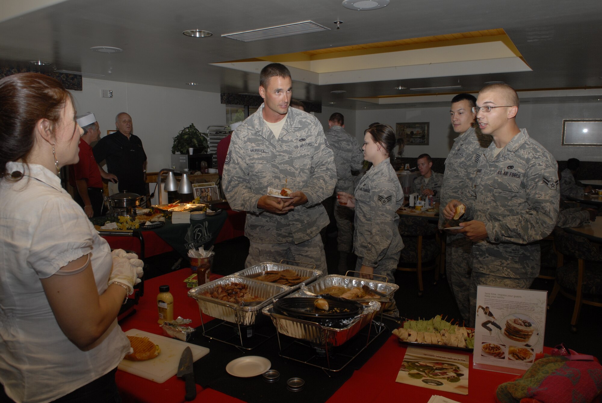 Luke Air Force Base Airmen sample food from one of five vendors at the Ray V. Hensman Dining Facility food show. Attendees were offered a variety of entrees, desserts and soups.