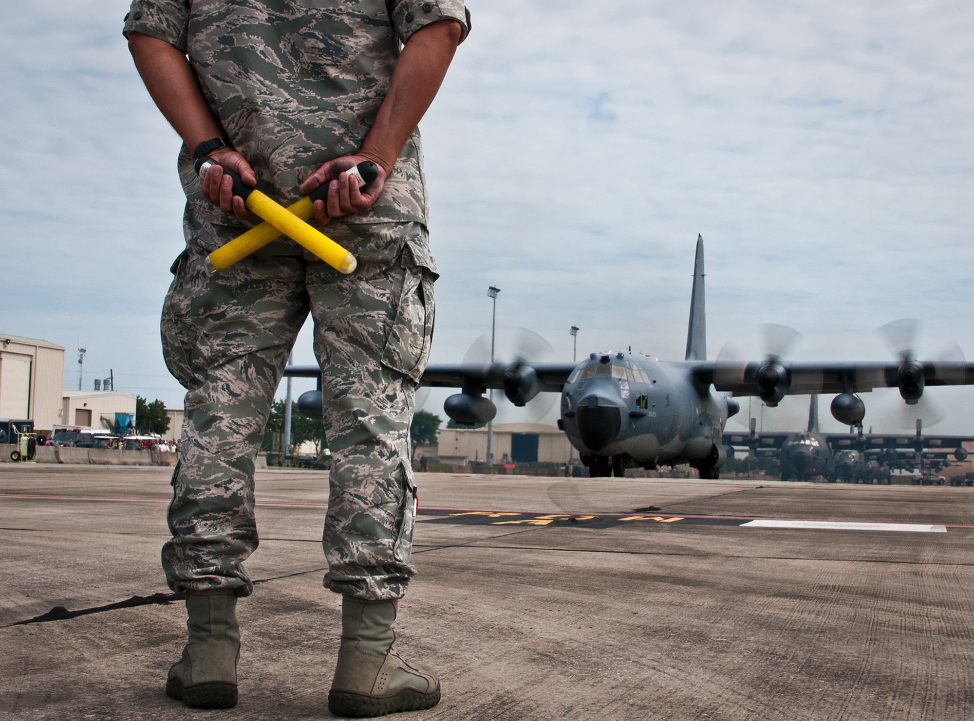 Master Sgt. Kent Castro, of the 919th Aircraft Maintenance Squadron, waits to begin marshalling out the MC-130E Combat Talon I, 64-0523“Godfather” to its final flight June 22 at Duke Field, Fla.  The final flight landed at Cannon Air Force Base, N.M., where 0523 will become a static display at the base’s airpark.  The aircraft has the distinction of leading the Air Force’s assault force during the Son Tay Raid to rescue prisoners of war in Vietnam in 1970.  (U.S. Air Force photo/Tech. Sgt. Samuel King Jr.)