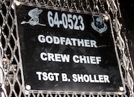Aircraft 64-0523’s name plate shows the aircraft’s nickname and the current crew chief.  The aircraft never officially had a nickname until it was given the name “Godfather” by Rick Andreozzi, who was its first crew chief when it arrived to Duke Field in 2000.  0523 lead the Air Force’s assault force during the Son Tay Raid to rescue prisoners of war in Vietnam in 1970.  (U.S. Air Force photo/Tech. Sgt. Samuel King Jr.)