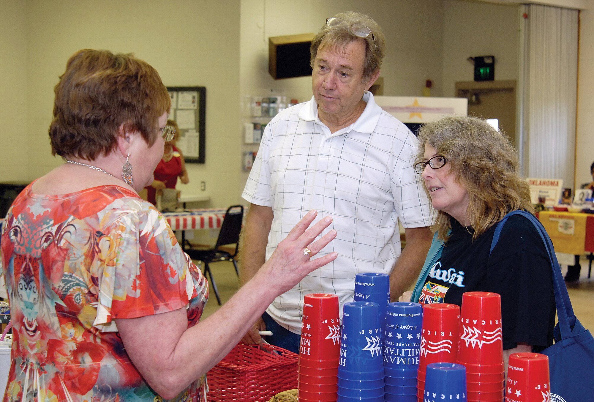 Military retirees Jim and Linda Vaughn, from Sparks, get answers to their TRICARE questions during the June 16th annual Tinker Military Retiree Appreciation Day.  Informational booths in the base chapel fellowship hall offered retirees medical information and current advise on veterans’ benefits. (Air Force photo by Margo Wright)