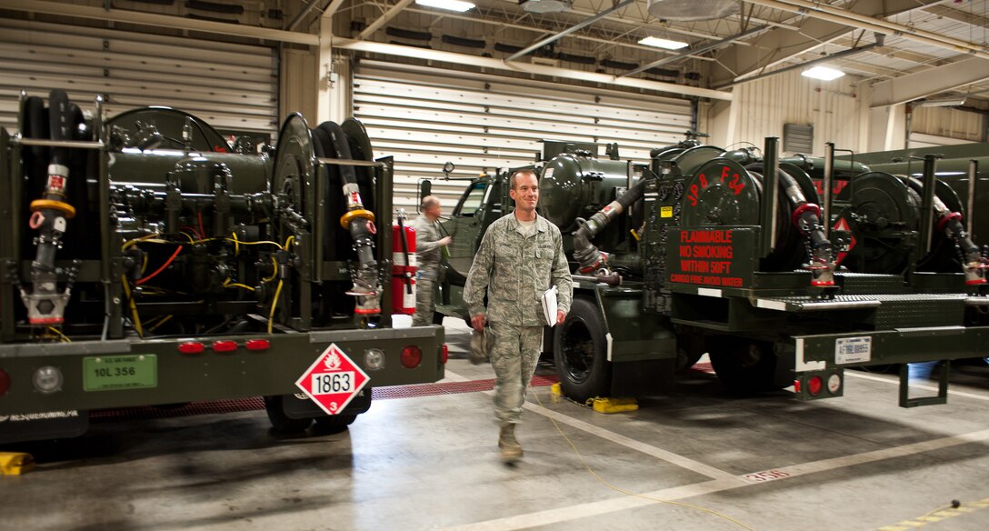 Tech. Sgt. Erich Basler, 28th Bomb Wing ground safety technician, performs an annual inspection in the 28th Logistics Readiness Squadron fuels section at Ellsworth Air Force Base, S.D., June 20, 2012. 28th BW ground safety office is required to inspect each facility annually to ensure compliance with U.S. Air Force and Occupational Safety and Health Administration safety standards. (U.S. Air Force photo by Airman 1st Class Alystria Maurer/Released) 