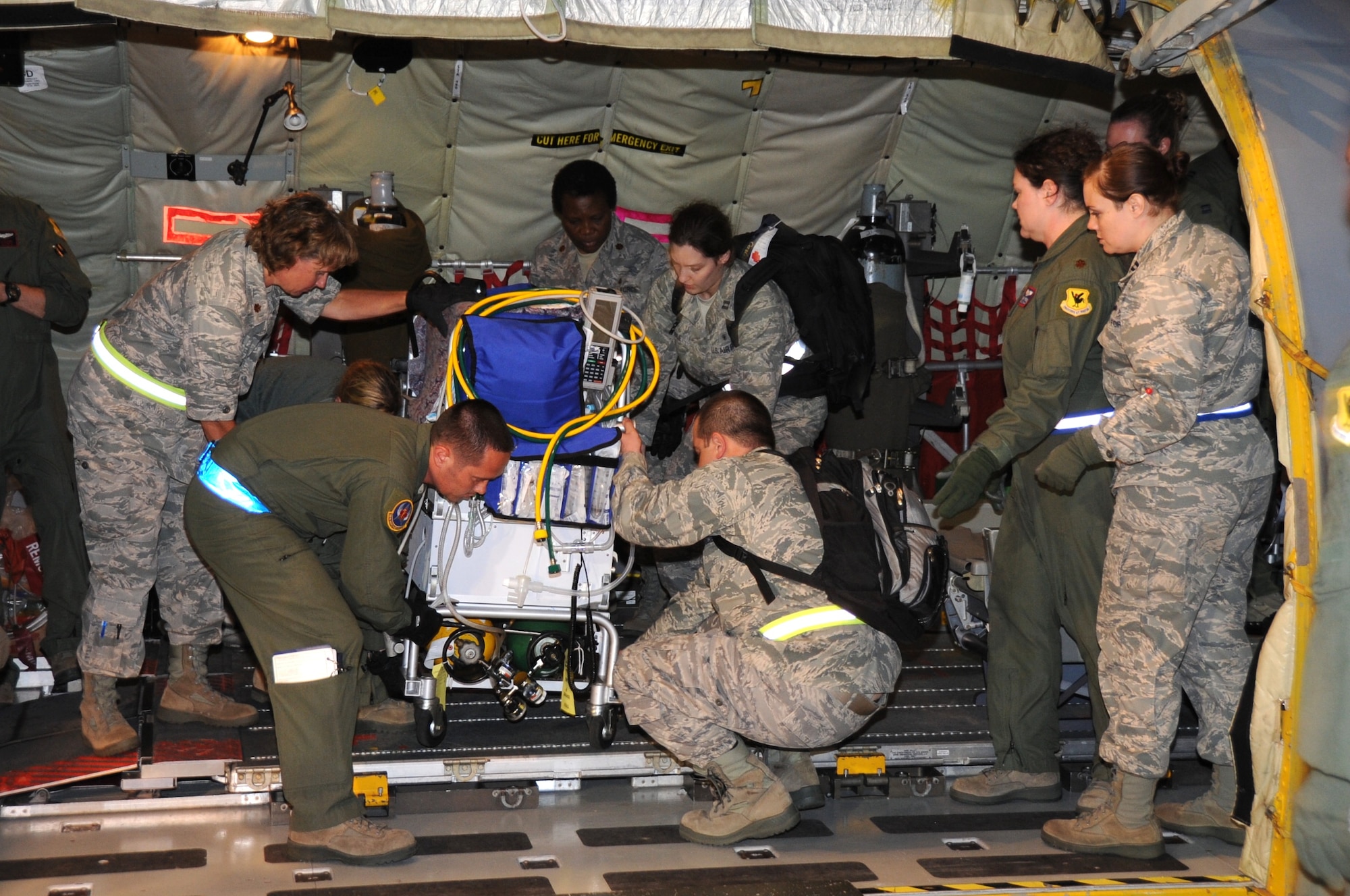 JOINT BASE PEARL HARBOR-HICKAM, Hawaii – Members of active duty and Reserve Air Force components unload a baby in an incubator from a KC-135 Stratotanker aeromedical evacuation flight, here, June 21, 2012. Members of the 442nd Medical Squadron are on temporary duty working and training in various positions on base. The 442nd MDS is part of the 442nd Fighter Wing, an A-10 Thunderbolt II Air Force Reserve unit at Whiteman Air Force Base, Mo. (U.S. Air Force photo/Staff Sgt. Lauren Padden)