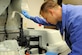 Staff Sgt. Steven Romel, 2nd Medical Support Squadron hematology NCO in charge, inspects and prepares blood samples for testing on Barksdale Air Force Base, La., June 19. The integrated chemistry machine tests the blood's content for the proper chemicals and blood cell count. (U.S. Air Force photo/Airman 1st Class Andrew Moua)(RELEASED)