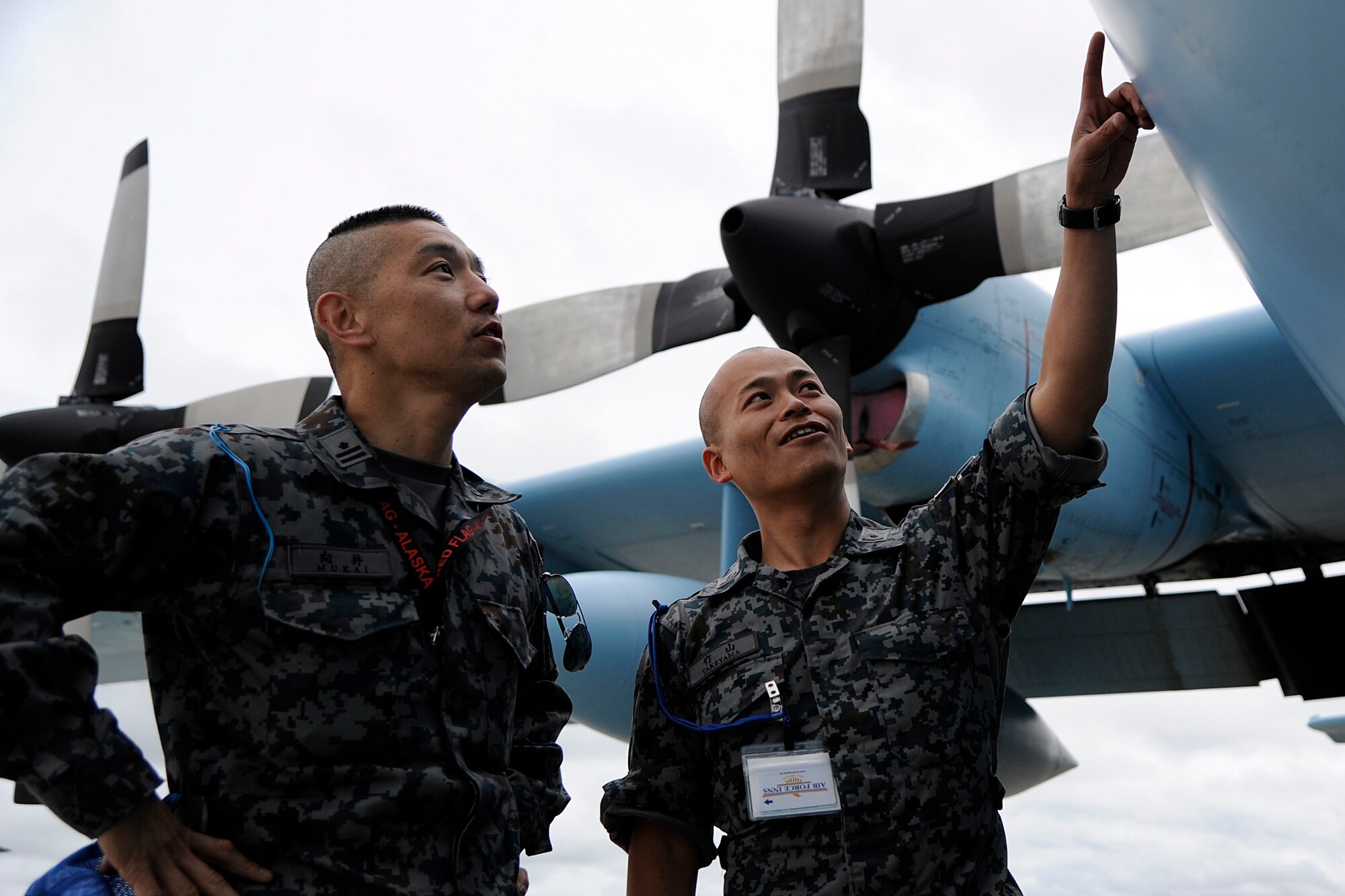 Members of the Japanese Air Self Defense Force inspect a Japanese C-130 Hercules during Red Flag - Alaska on the flight line of Joint Base Elmendorf-Richardson, Alaska June 19. The C-130 Hercules offers a maximum speed of 600 kilometers an hour with a payload of 19,400 pounds and can be used for air drops. Red-Flag Alaska is designed to strengthen bilateral ties between nations and offers the JASDF the opportunity to improve aerial tactics. (U.S. Air Force photo/Staff Sgt. Zachary Wolf)