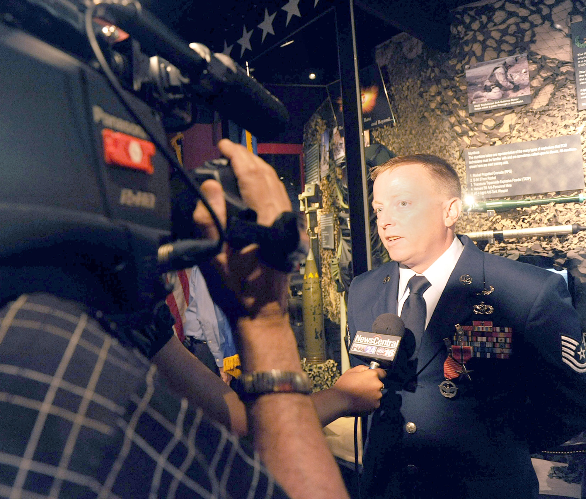 Tech Sgt. Barry Duffield, a 116th Air Control Wing Explosive Ordnance Disposal Flight team leader, speaks with reporters Monday after receiving the Bronze Star Medal. 