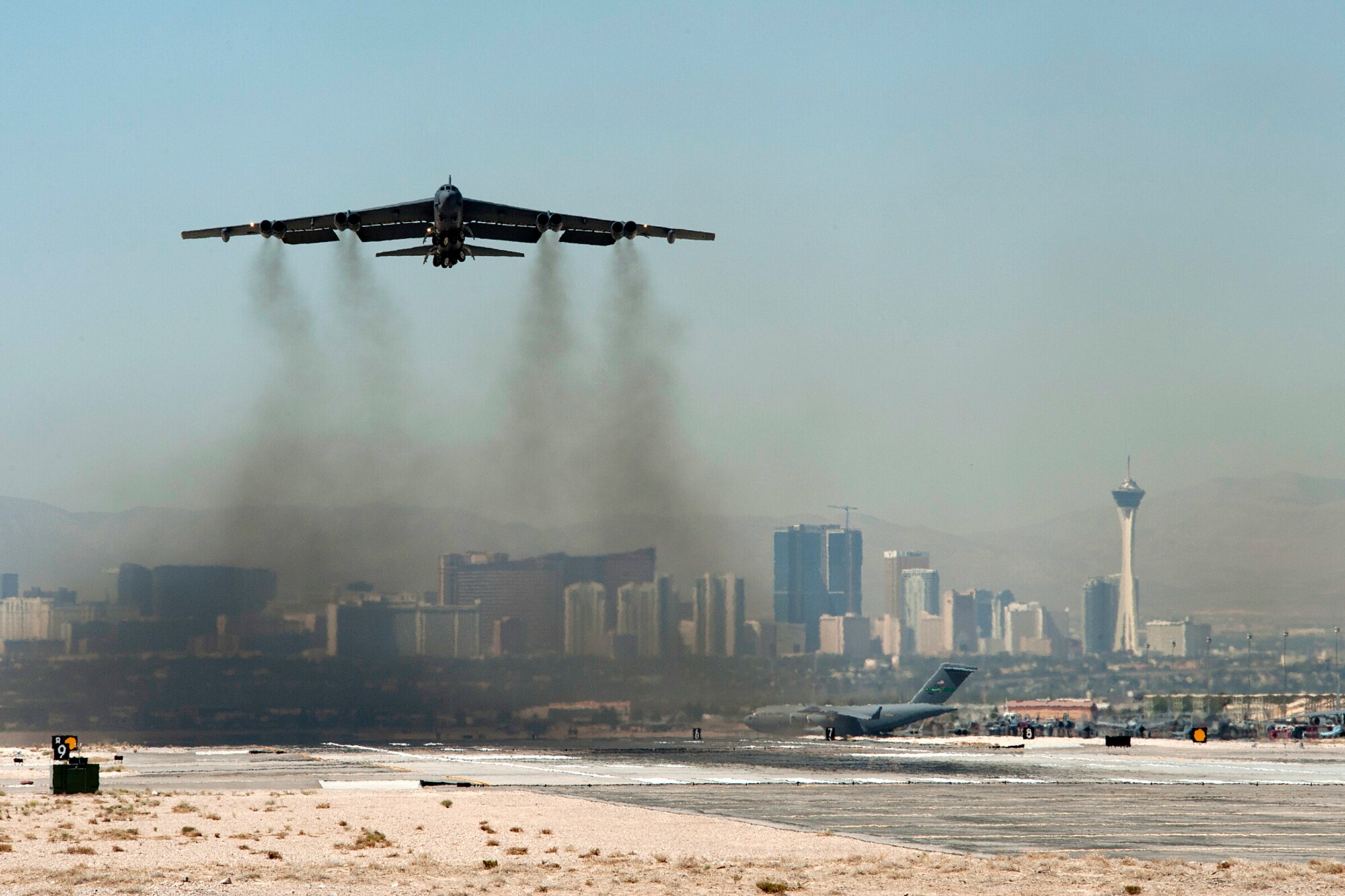 A 93rd Bomb Squadron B-52H Stratofortress leaves Nellis Air Force Base, Nev., for home after supporting a Mission Employment exercise, June 12, 2012. The 307th Bomb Wing at Barksdale AFB, La., deployed three B-52s to Nellis in support of the exercise. (U.S. Air Force photo by Master Sgt. Greg Steele/Released)