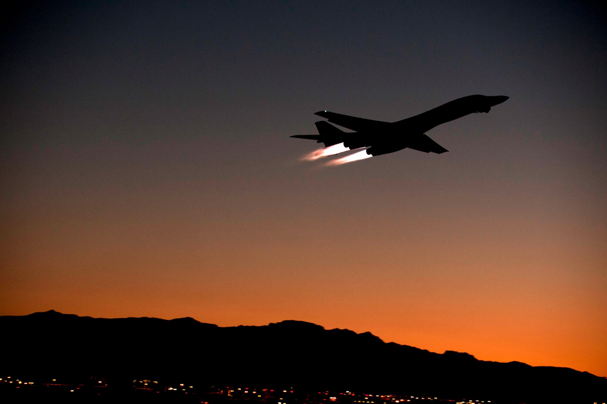 A U.S. Air Force B-1 bomber takes off for a night mission in support of a Mission Employment exercise, Nellis Air Force Base, Nev., June 11, 2012. The ME is a joint exercise that gives both aircrew and maintenance personnel the opportunity to integrate and work side-by-side other major weapons systems, such as the B-1 and B-52 bombers. (U.S. Air Force photo by Master Sgt. Greg Steele/Released)