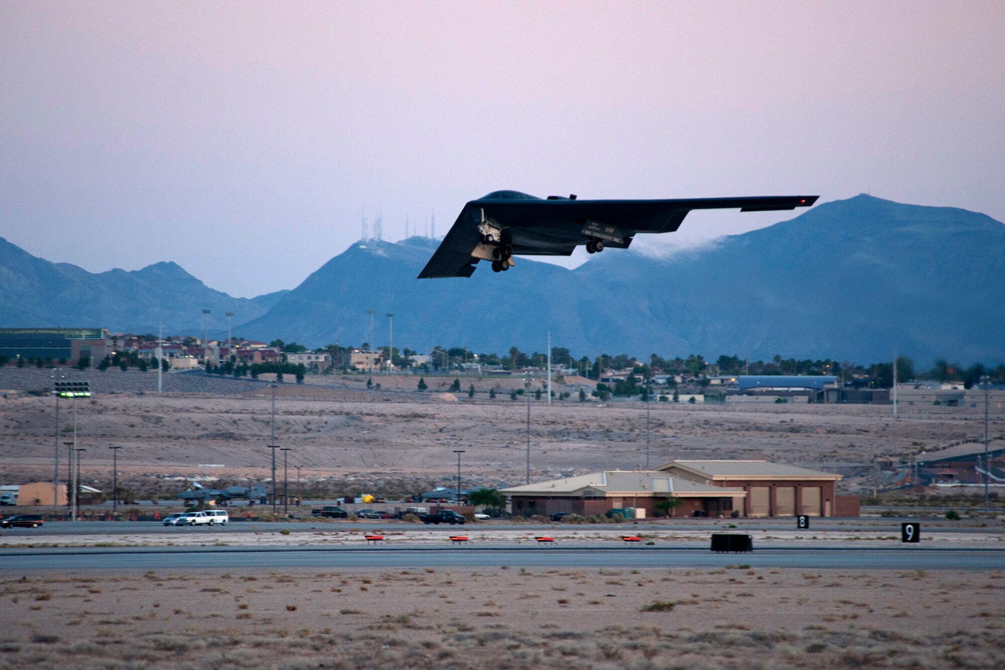 A U.S. Air Force B-2 bomber takes off for a night mission in support of a Mission Employment exercise, Nellis Air Force Base, La., June 11, 2012. The ME is a joint exercise and gives both aircrew and maintenance personnel the opportunity to integrate and work side-by-side other major weapons systems, such as the B-1 and B-52 bombers. (U.S. Air Force photo by Master Sgt. Greg Steele/Released)