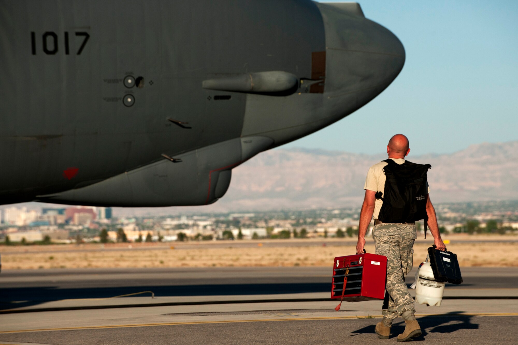 An aircraft mechanic prepares to start a preflight inspection on a 93rd Bomb Squadron B-52H Stratofortress prior to a sortie in support of the Mission Employment exercise, Nellis Air Force Base, Nev., June 10, 2012. Maintenance personnel from the 307th and 2nd Bomb Wings, Barksdale AFB, La., deployed to Nellis in support of the exercise. (U.S. Air Force photo by Master Sgt. Greg Steele/Released)