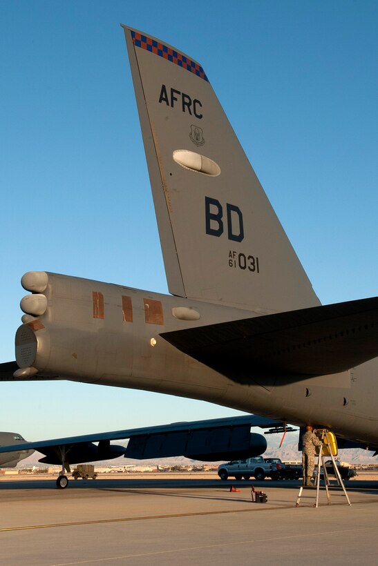 Maintenance personnel prepare a 93rd Bomb Squadron B-52H Stratofortress for a sortie in support of the Mission Employment exercise, Nellis Air Force Base, Nev., June 10, 2012. A combined maintenance team of 45 personnel from the 307th and 2nd Bomb Wings from Barksdale AFB, La., deployed to Nellis in support of the exercise and generated 14 aircraft sorties, resulting in a 100 percent mission capable rate. (U.S. Air Force photo by Master Sgt. Greg Steele/Released)