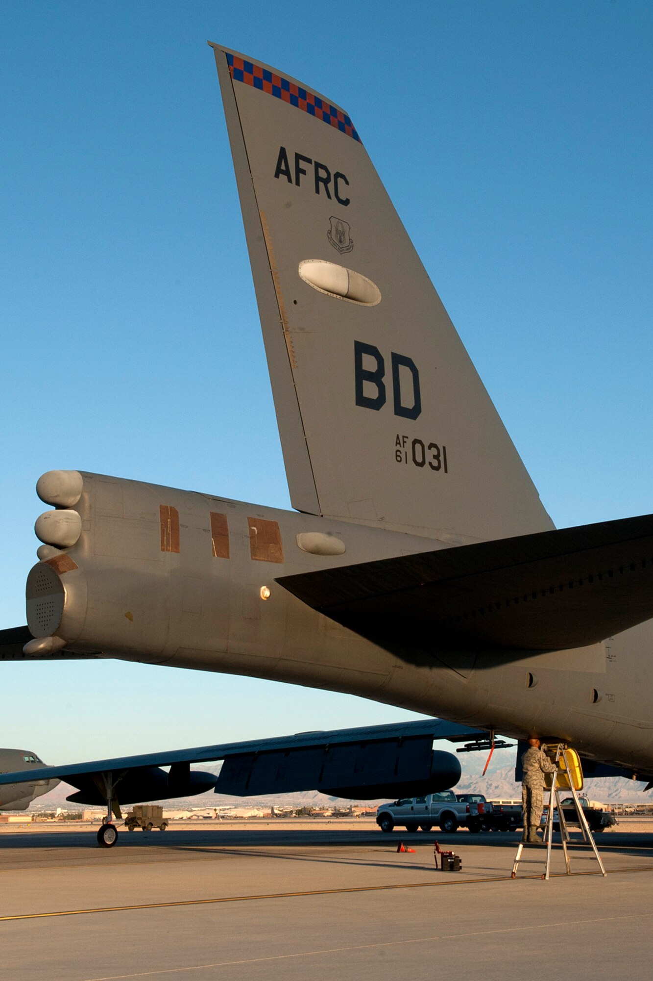 Maintenance personnel prepare a 93rd Bomb Squadron B-52H Stratofortress for a sortie in support of the Mission Employment exercise, Nellis Air Force Base, Nev., June 10, 2012. A combined maintenance team of 45 personnel from the 307th and 2nd Bomb Wings from Barksdale AFB, La., deployed to Nellis in support of the exercise and generated 14 aircraft sorties, resulting in a 100 percent mission capable rate. (U.S. Air Force photo by Master Sgt. Greg Steele/Released)
