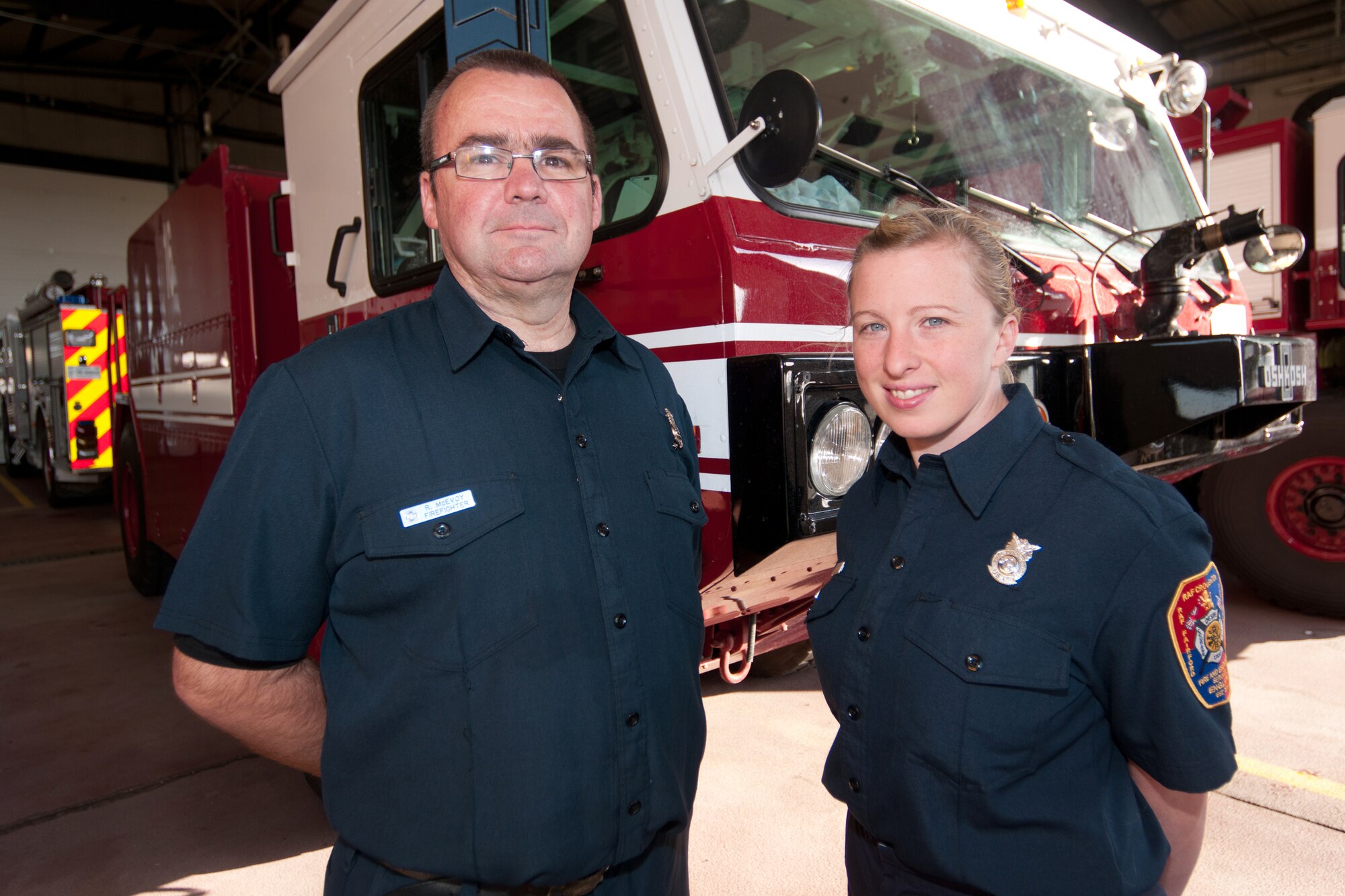 RAF FAIRFORD, United Kingdom - Fairford firefighters, Robert McEvoy and Lynsey Pope, were recently named the Air Force Robert A. McAllister Heroism Award winners. The award recognizes acts of courage above and beyond the call of duty. (U.S. Air Force photo by Senior Airman Joel Mease)