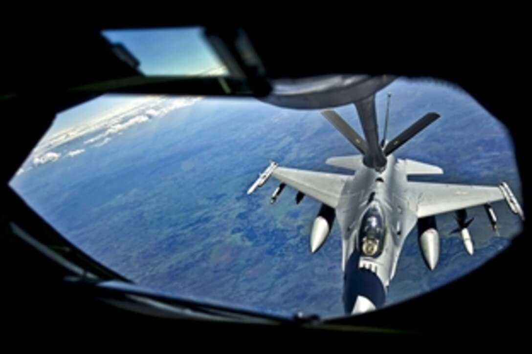 A U.S. Air Force F-16C Fighting Falcon moves into position to receive fuel from a U.S. Air Force KC-135 Stratotanker during Red Flag-Alaska 12-2 over the Joint Pacific Alaska Range Complex near Eielson Air Force Base, Alaska, June 20, 2012. Pacific Air Forces sponsored the exercise, which takes place in the Joint Pacific Alaska Range Complex and a portion of western Canada.