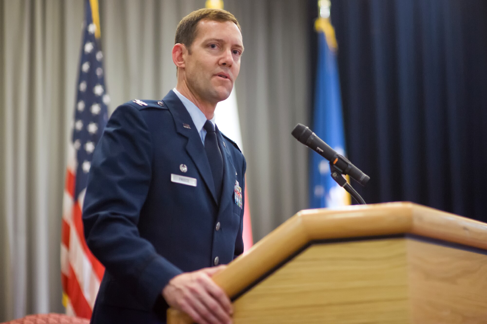 YOKOTA AIR BASE, Japan -- Col. Todd Freece, 374th Mission Support Group commander, gives a speech during the 374th Contracting Squadron change of command ceremony at Yokota Air Base, Japan, on June 22, 2012. The change of command is a traditional military ceremony in which the departing commander assembles their personnel for presentation to the incoming commander. (U.S. Air Force photo by Osakabe Yasuo)