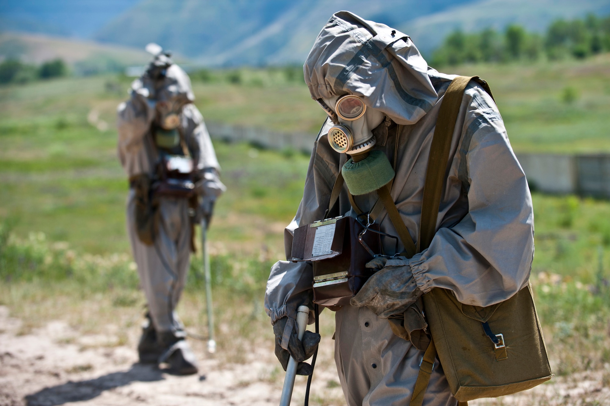 Kyrgyz Republic Sgt. Nuvlau Imanbekov searches for simulated contaminated materials as part of a chemical, biological, radiological, nuclear, and explosives training scenario during Exercise Regional Cooperation 12 at the Koi Tash Military Academy, June 22, 2012. Regional Cooperation 12 is a multinational exercise designed to strengthen relationships and promote regional cooperation among the participating nations while offering coordinated, rapid response scenarios in the event of a disaster affecting multiple countries within the region. (U.S. Air Force photo/Senior Airman Brett Clashman)