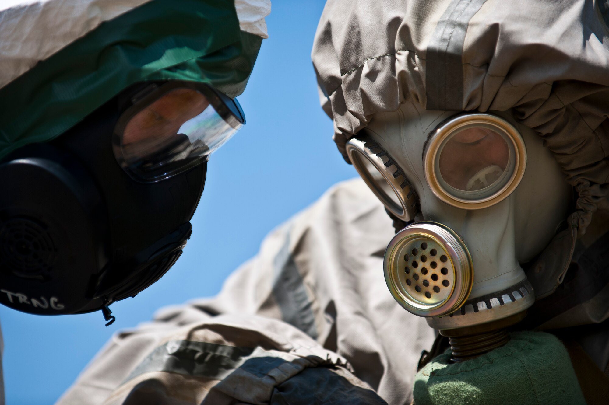 Master Sgt. Michael English (left) and Kyrgyz Republic Sgt. Nuvlau Imanbekov assess the readings of simulated contaminated materials in a chemical, biological, radiological, nuclear, and explosives training scenario during Exercise Regional Cooperation 12 at the Koi Tash Military Academy, June 22, 2012. Regional Cooperation 12 is a multinational exercise designed to strengthen relationships and promote regional cooperation among the participating nations while offering coordinated, rapid response scenarios in the event of a disaster affecting multiple countries within the region. English is a 376th Expeditionary Civil Engineer Squadron emergency management flight chief deployed out of Fairchild Air Force Base, Wash. and is a native of Washington, Ga. (U.S. Air Force photo/Senior Airman Brett Clashman)
