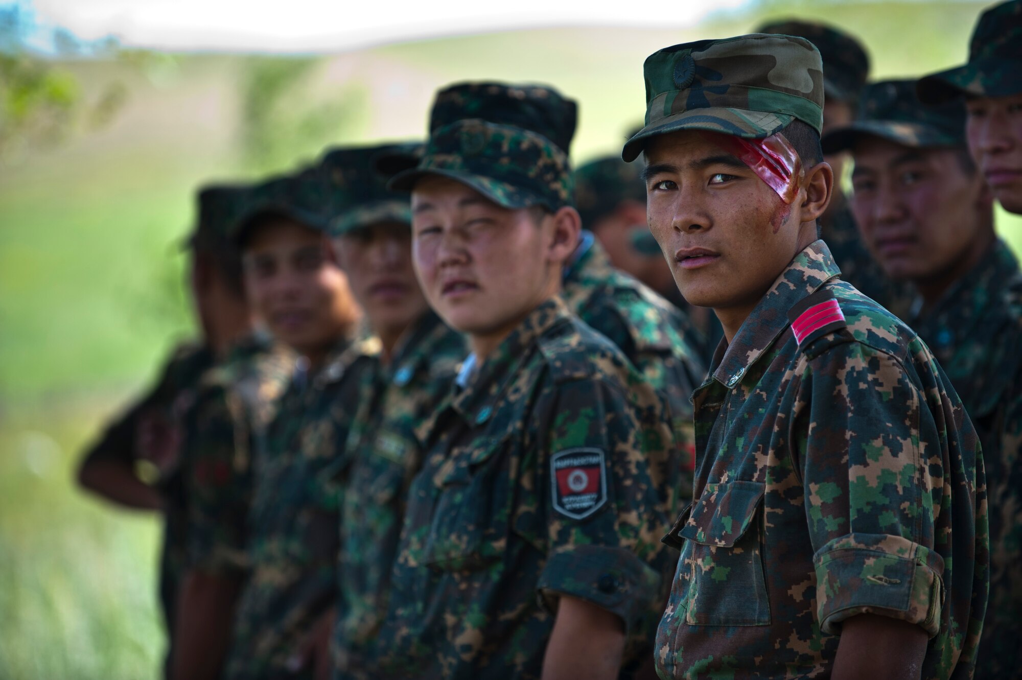 Kyrgyz Republic Sgt. Salamat Remirkov, along with his fellow service members, prepare to act as simulated casualties during a mass casualty scenario as part of Exercise Regional Cooperation 12 at the Koi Tosh Military Academy, Kyrgyzstan, June 22, 2012. The scenario tested first responders on reaction time, aid requirements and rate of evacuation. Regional Cooperation 12 is a multinational exercise designed to strengthen relationships and promote regional cooperation among the participating nations while offering coordinated, rapid response scenarios in the event of a disaster affecting multiple countries within the region. (U.S. Air Force photo/Senior Airman Brett Clashman)