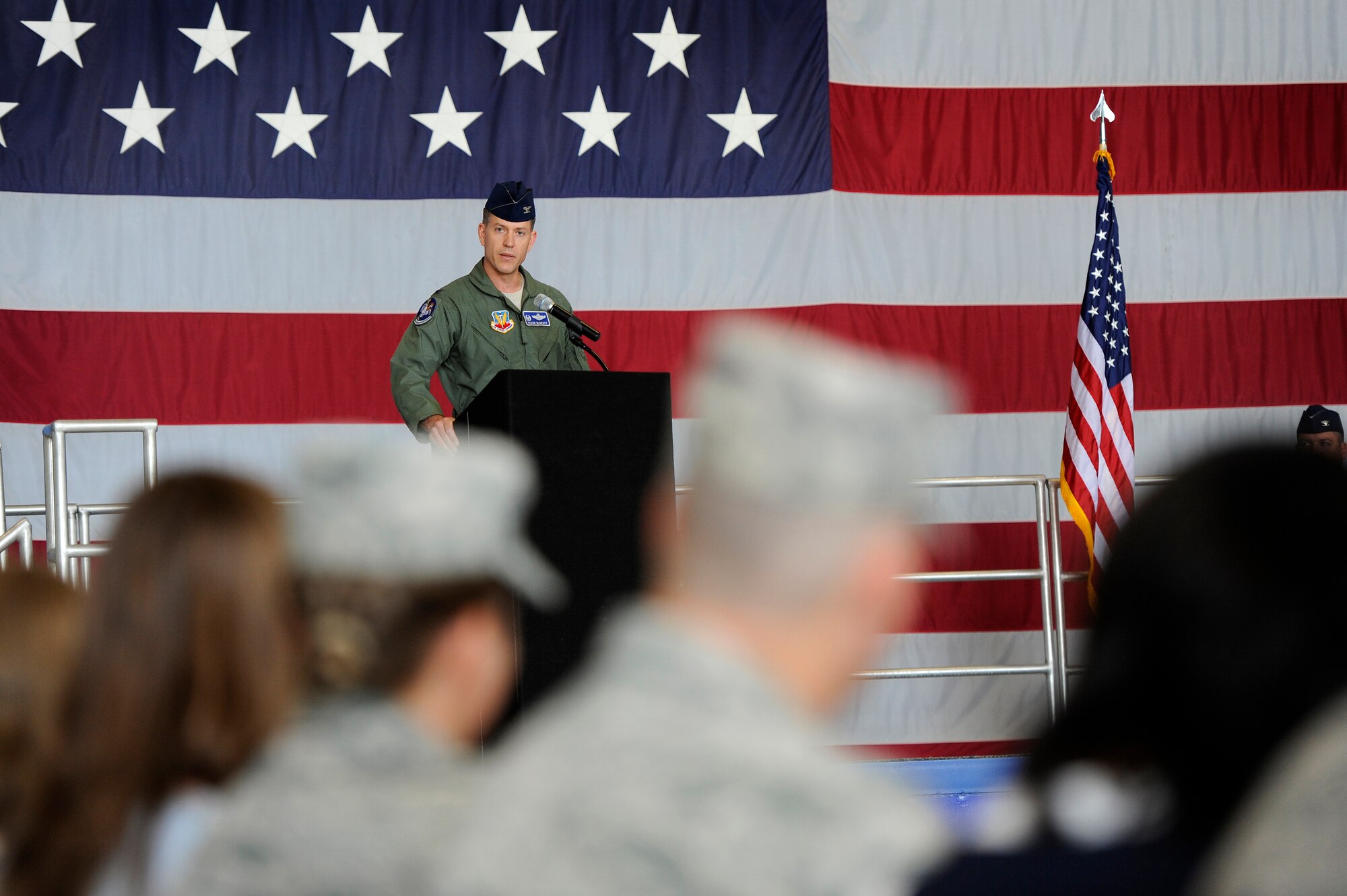 U.S. Air Force Col. Shaun McGrath, incoming 20th Operations Group commander, introduces himself to the men and women of the 20th Fighter Wing during the 20th OG change of command ceremony, June 22, 2012, Shaw Air Force Base, S.C. Col. James Sears, outgoing 20th OG commander, will be taking a new assignment at Columbus Air Force Base, Miss. while McGrath has taken over as the new 20th OG commander. (U.S. Air Force photo by Senior Airman Kenny Holston/Released) 