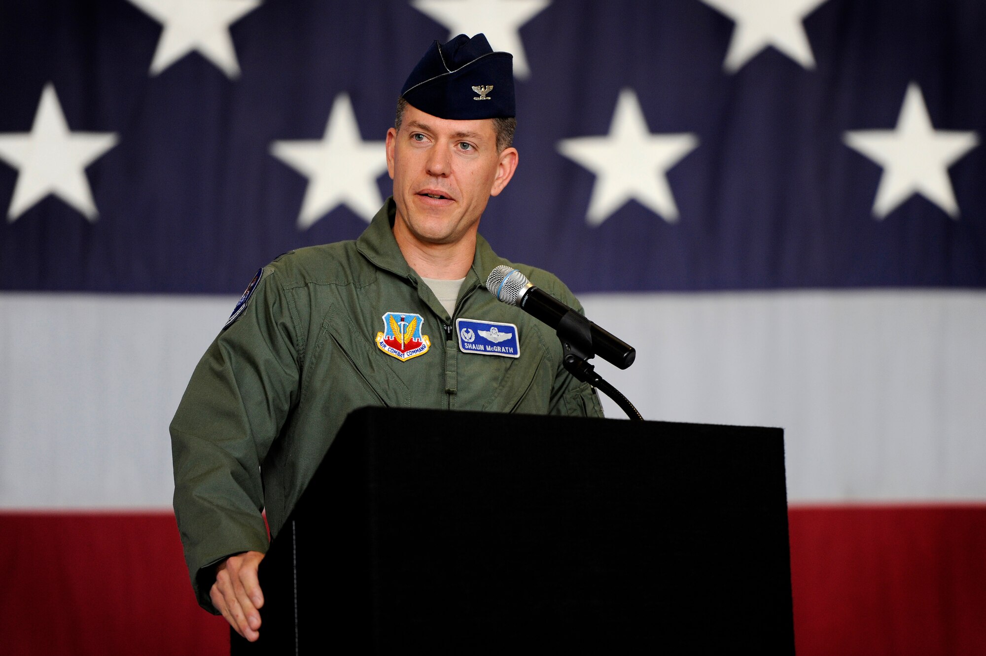 U.S. Air Force Col. Shaun McGrath, incoming 20th Operations Group commander, introduces himself to the men and women of the 20th Fighter Wing during the 20th OG change of command ceremony, June 22, 2012, Shaw Air Force Base, S.C. Col. James Sears, outgoing 20th OG commander, will be taking a new assignment at Columbus Air Force Base, Miss. while McGrath has taken over as the new 20th OG commander. (U.S. Air Force photo by Senior Airman Kenny Holston/Released) 