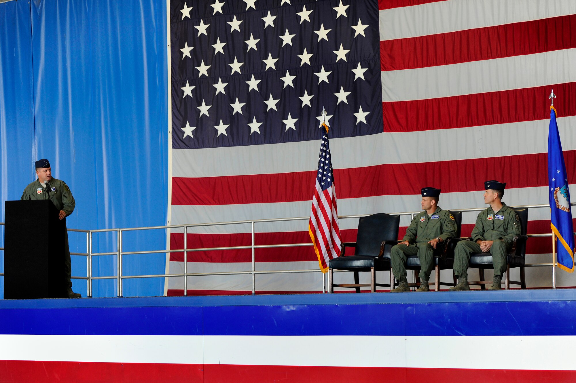 U.S. Air Force Col. Don Godier, 20th Fighter Wing vice commander, says a few words about outgoing 20th Operations Group commander, Col. James Sears, before welcoming incoming 20th OG commander, Shaun McGrath, during a change of command ceremony, June 22, 2012, Shaw Air Force Base, S.C. Sears will be taking a new assignment at Columbus Air Force Base, Miss. while McGrath has taken over as the new 20th OG commander. (U.S. Air Force photo by Senior Airman Kenny Holston/Released) 