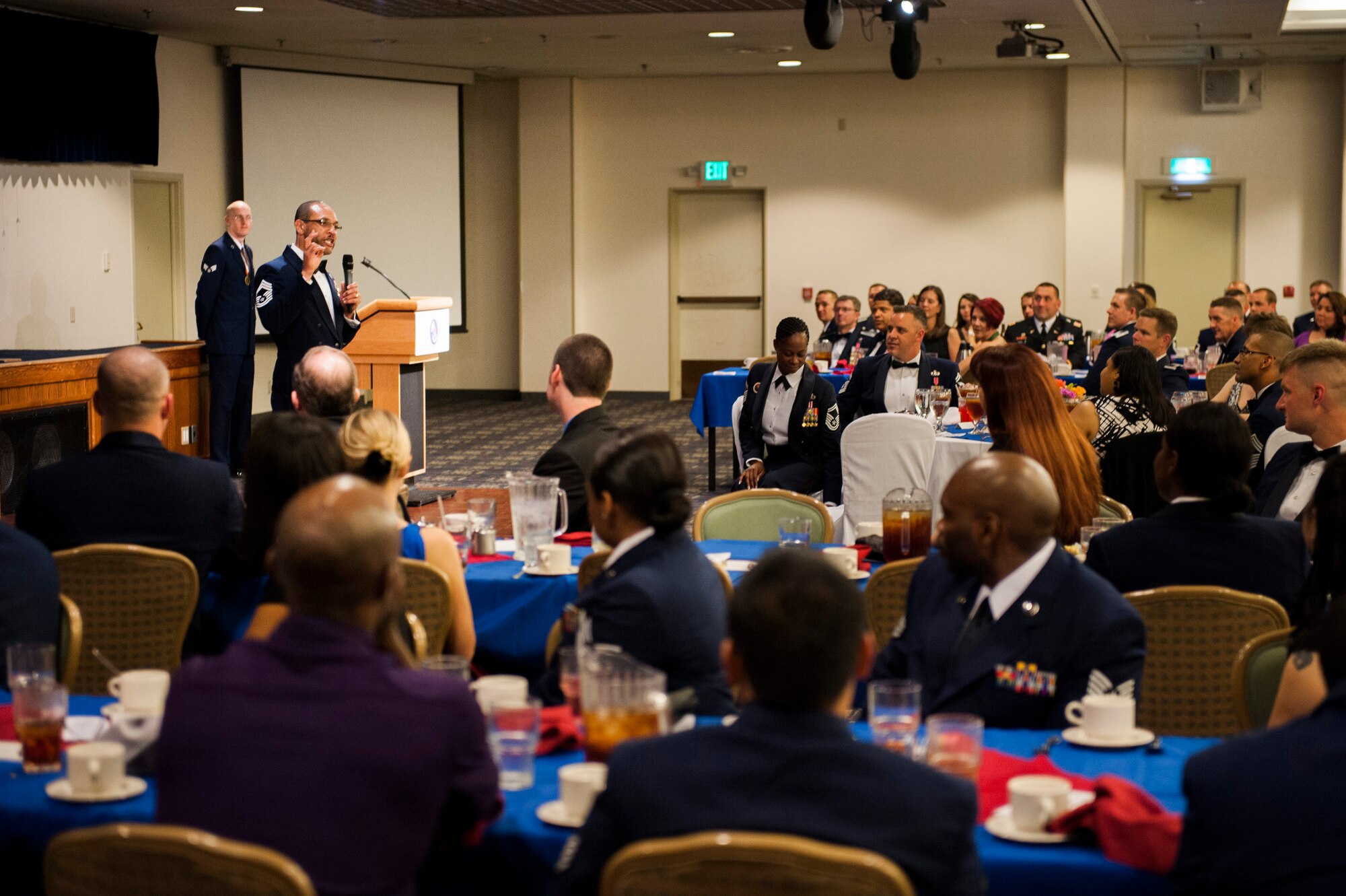 YOKOTA AIR BASE, Japan -- Chief Master Sgt. Roosevelt Neely, 374th Communications Squadron superintendent, talks about his experiences with supervision during the Airman Leadership School Class 12-E graduation June 21, 2012, at Yokota Air Base, Japan. Neely talked about leaders who have had an impact on him, both positive and negative, and how supervising Airmen is a gift and an honor. (U.S. Air Force photo by Tech. Sgt. Samuel Morse)