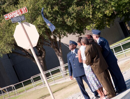 Maj. Gen. Alfred Stewart, Air Force Personnel Center commander, Col. Tom Murphy, 47th Flying Training Wing commander, and the fourth Chief Master Sgt. of the Air Force Thomas Barnes’ daughters  Hazel Lamb, Theresa Neal and Thyra Barnes, unveil the renamed Barnes Street at the Second Street renaming ceremony held at Laughlin Air Force Base, Texas, June 25,2012. The ceremony was held in honor of Chief Barnes’ past service as command chief at Laughlin and his appointment in 1973 as the first and only African American to serve in the highest enlisted position within the U.S. Air Force. (U.S. Air Force photo/Airman 1st Class Nathan Maysonet)