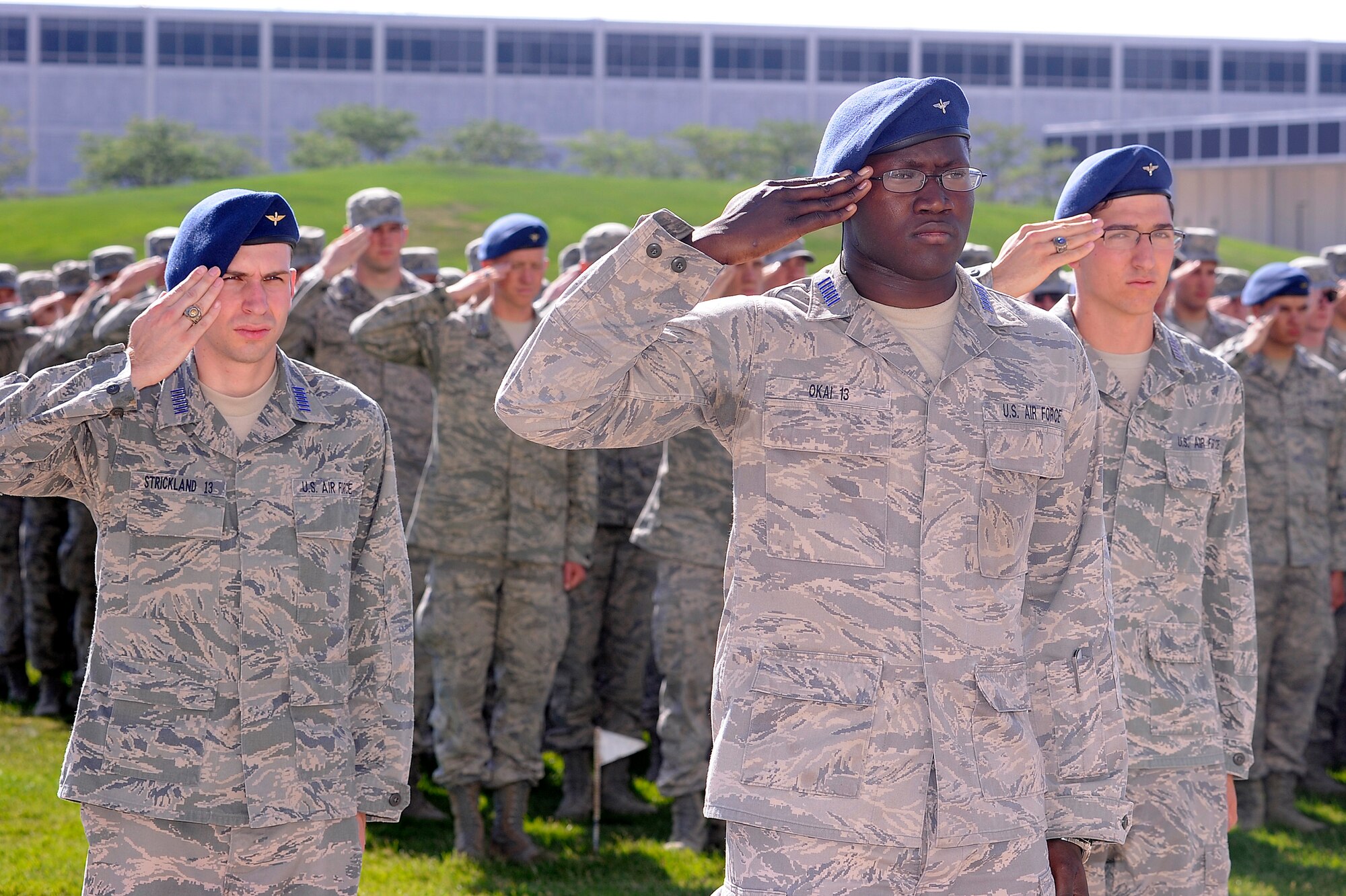 Air Force Academy cadets salute during the change of command ceremony June 25. Brig. Gen. Gregory Lengyel replaces Brig. Gen. Richard Clark as commandant of cadets. Clark has been nominated for a Defense Attaché position. (U.S. Air Force Photo/Mike Kaplan)